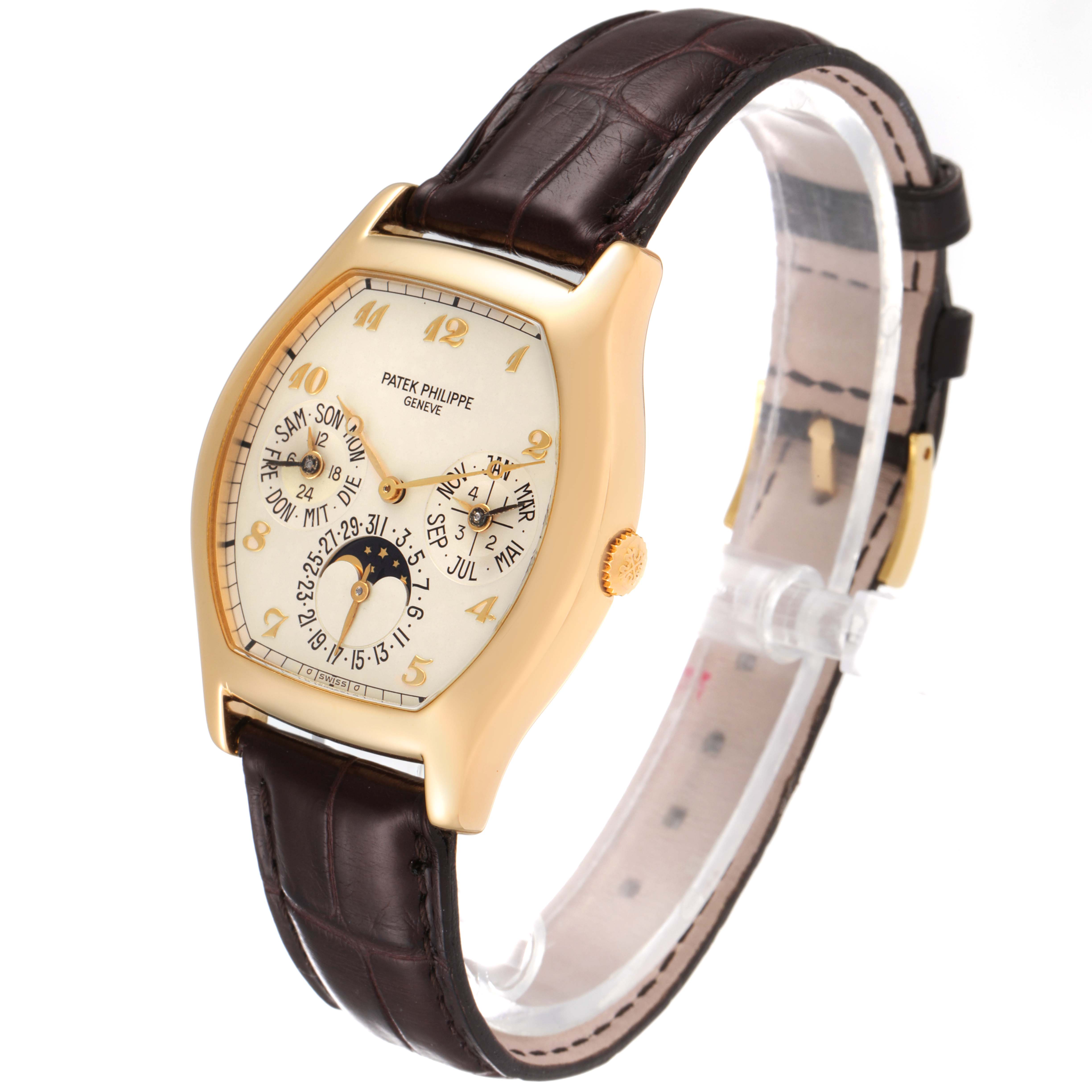 This image shows a Patek Philippe Complications 5040 Men's Yellow Gold Silver Dial 5040 Men's Yellow Gold Silver Dial watch at an angle, highlighting its dial, case, and leather strap.