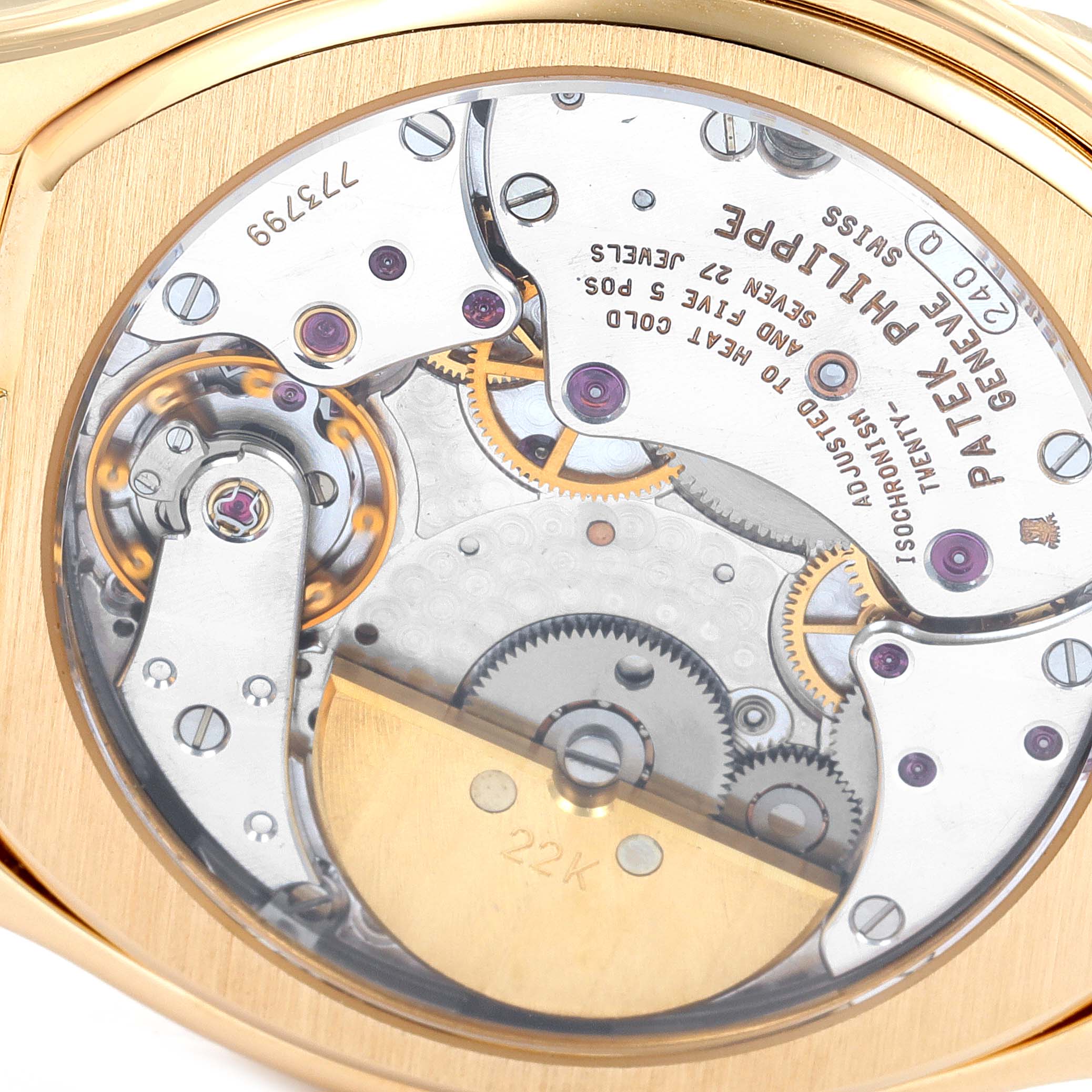 This image shows the rear view of the internal mechanical movements of a Patek Philippe Complications 5040 Men's Yellow Gold Silver Dial 5040 Men's Yellow Gold Silver Dial watch, highlighting the intricate gears and cogs.