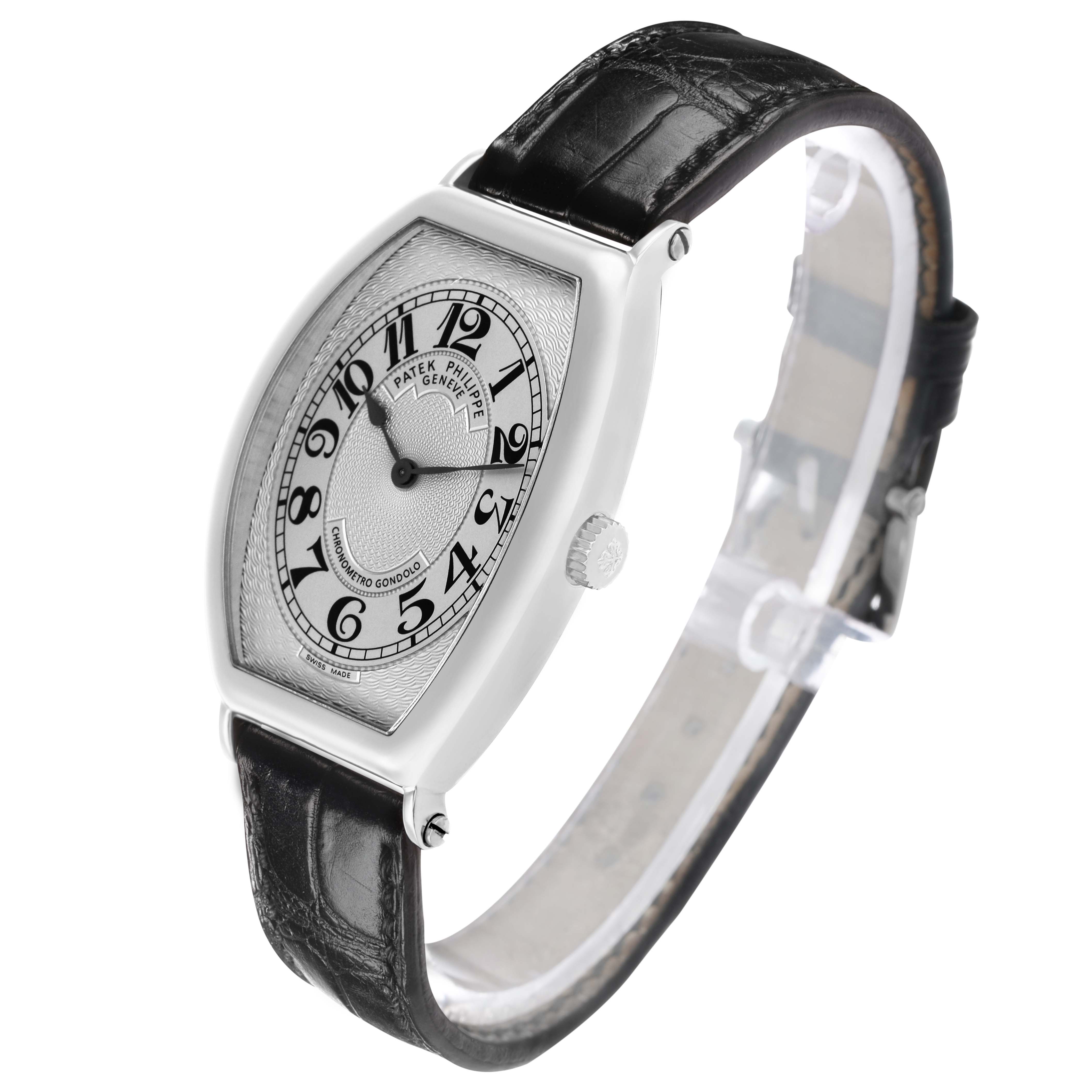 The Patek Philippe Gondolo 5098P-001 Men's Platinum Silver Dial watch is shown at a three-quarter angle, displaying its face, bezel, leather strap, and crown.