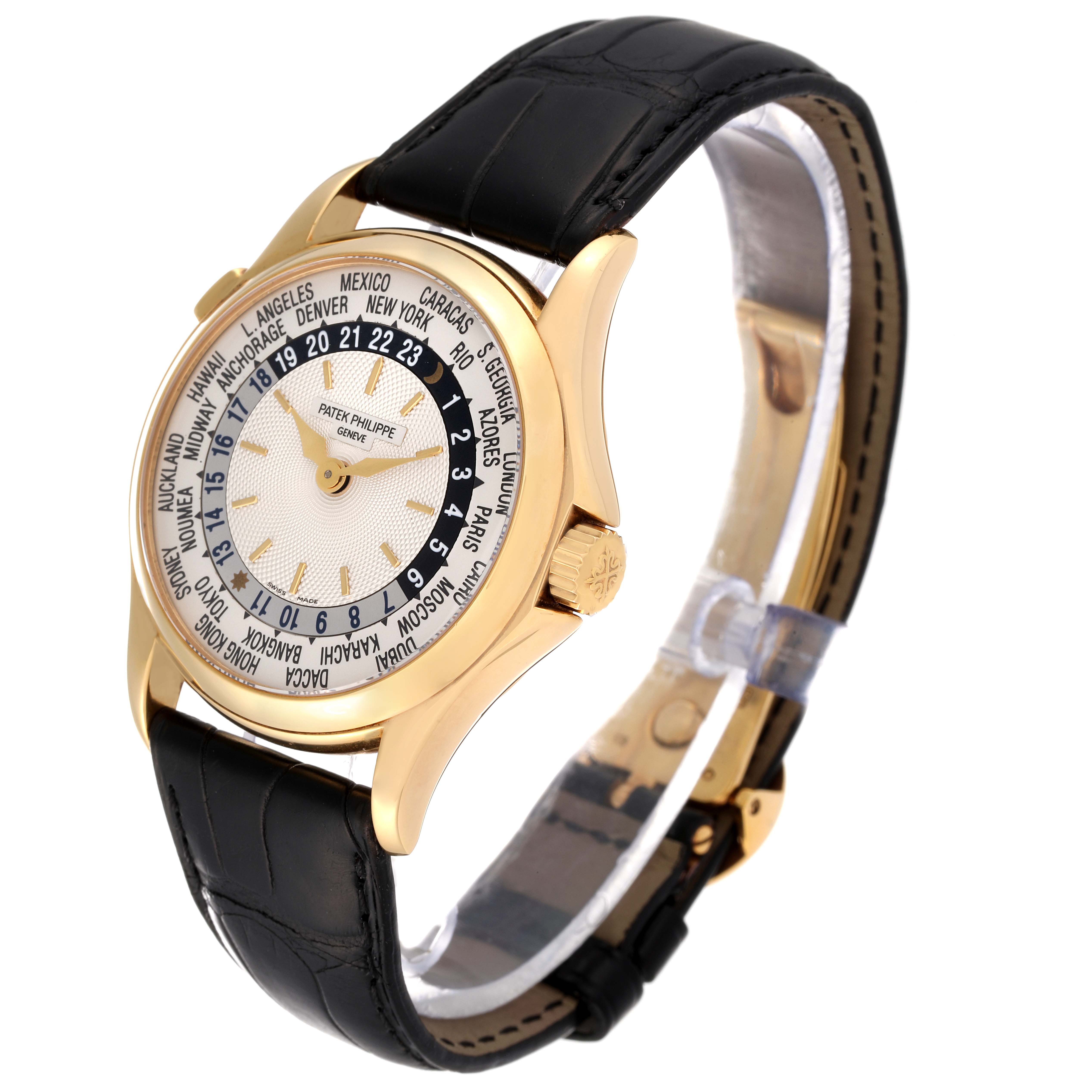 The image shows a Patek Philippe Complications 5110J Men's Yellow Gold Silver Dial 5110J Men's Yellow Gold Silver Dial model watch from a front and slight side angle, featuring its gold case, dial, and black leather strap.