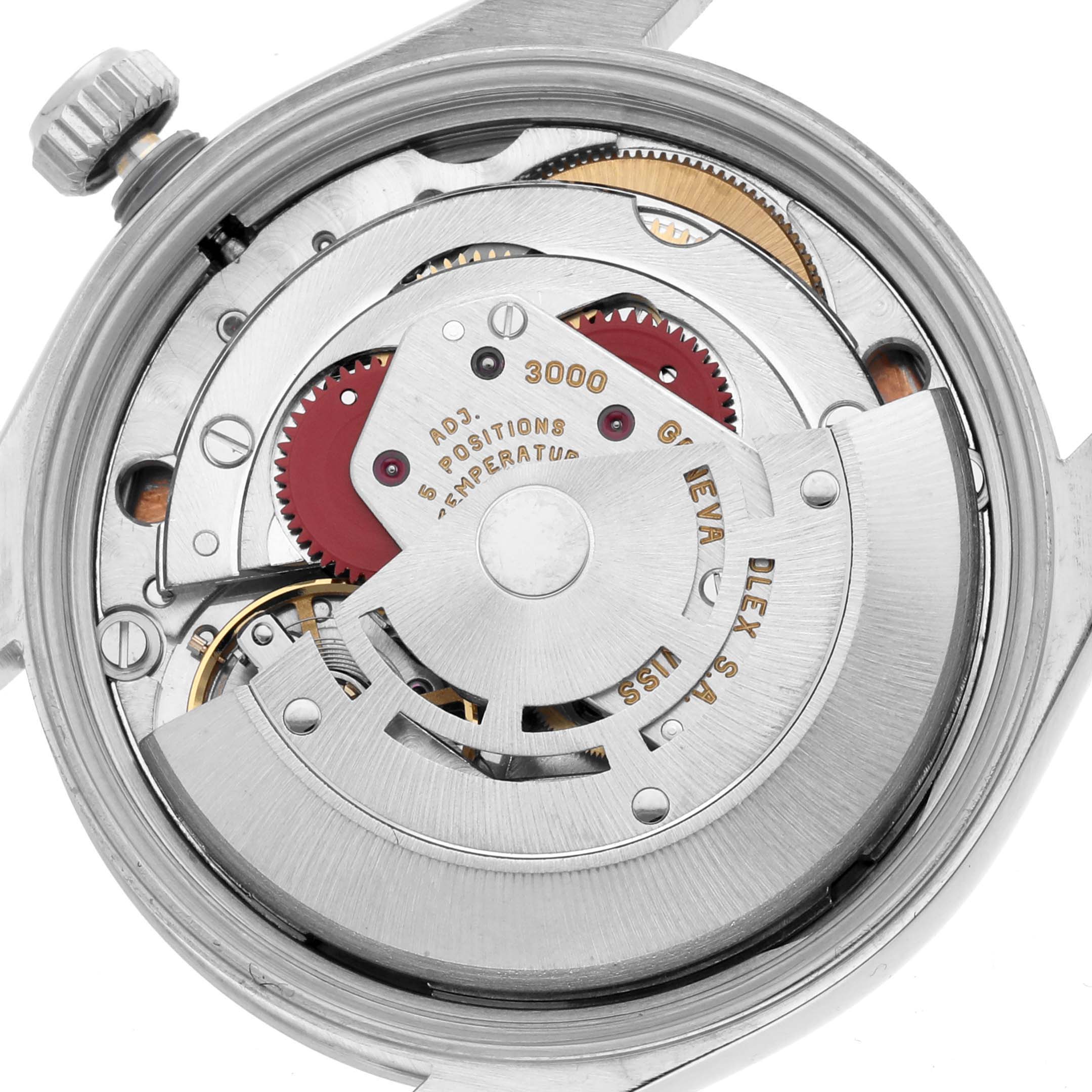 The image shows the internal mechanism of a Rolex Air-King 14000 Men's Stainless Steel Pink Dial watch, including gears and the rotor, viewed from the back.