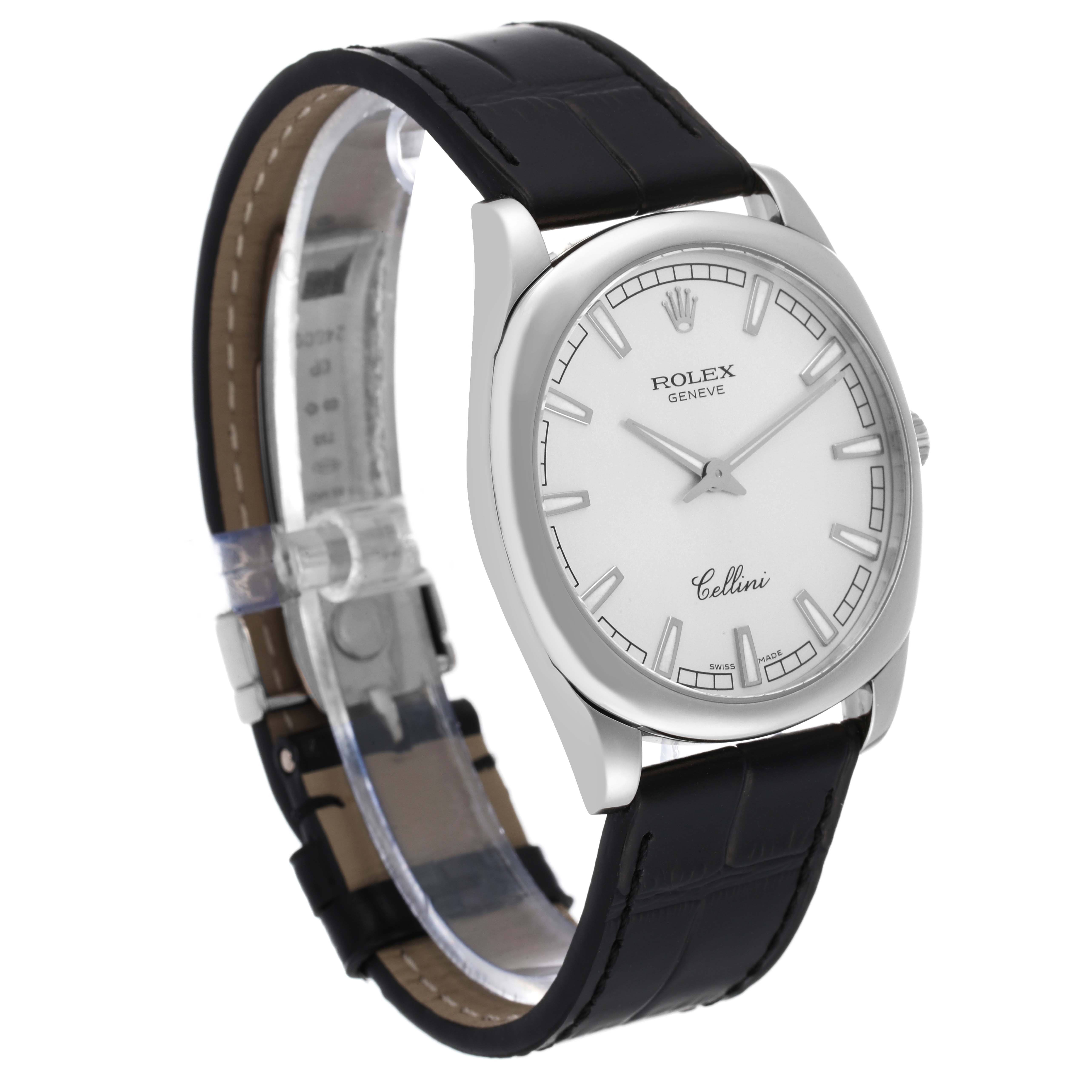 This image shows a Rolex Cellini 4243/9 Men
s White Gold Silver Dial 4243/9 Men
s White Gold Silver Dial watch from a three-quarter angled view, highlighting the dial, case, and black leather strap.