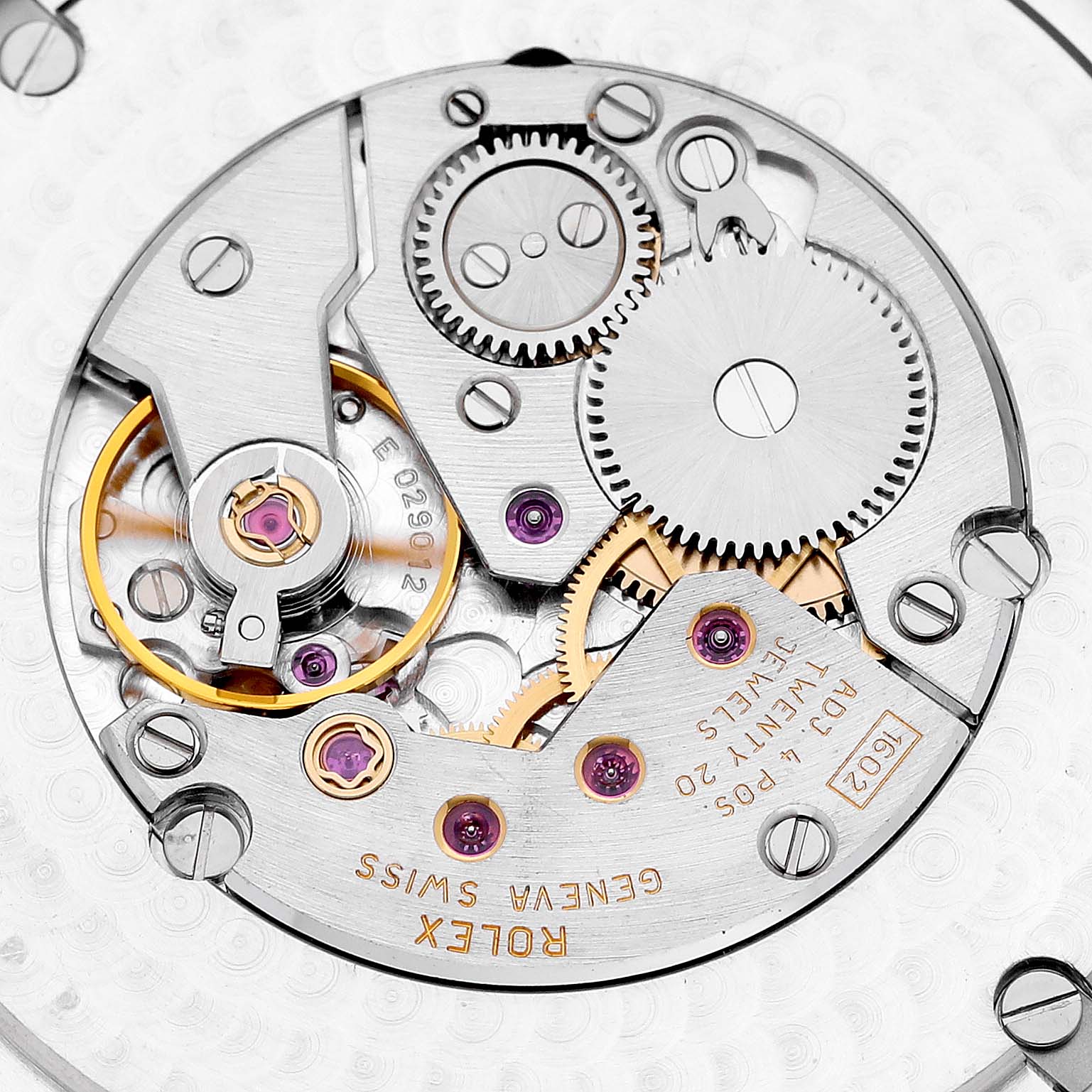 This image shows a close-up view of the intricate inner mechanical movement of a Rolex Cellini 4243/9 Men
s White Gold Silver Dial 4243/9 Men
s White Gold Silver Dial watch.
