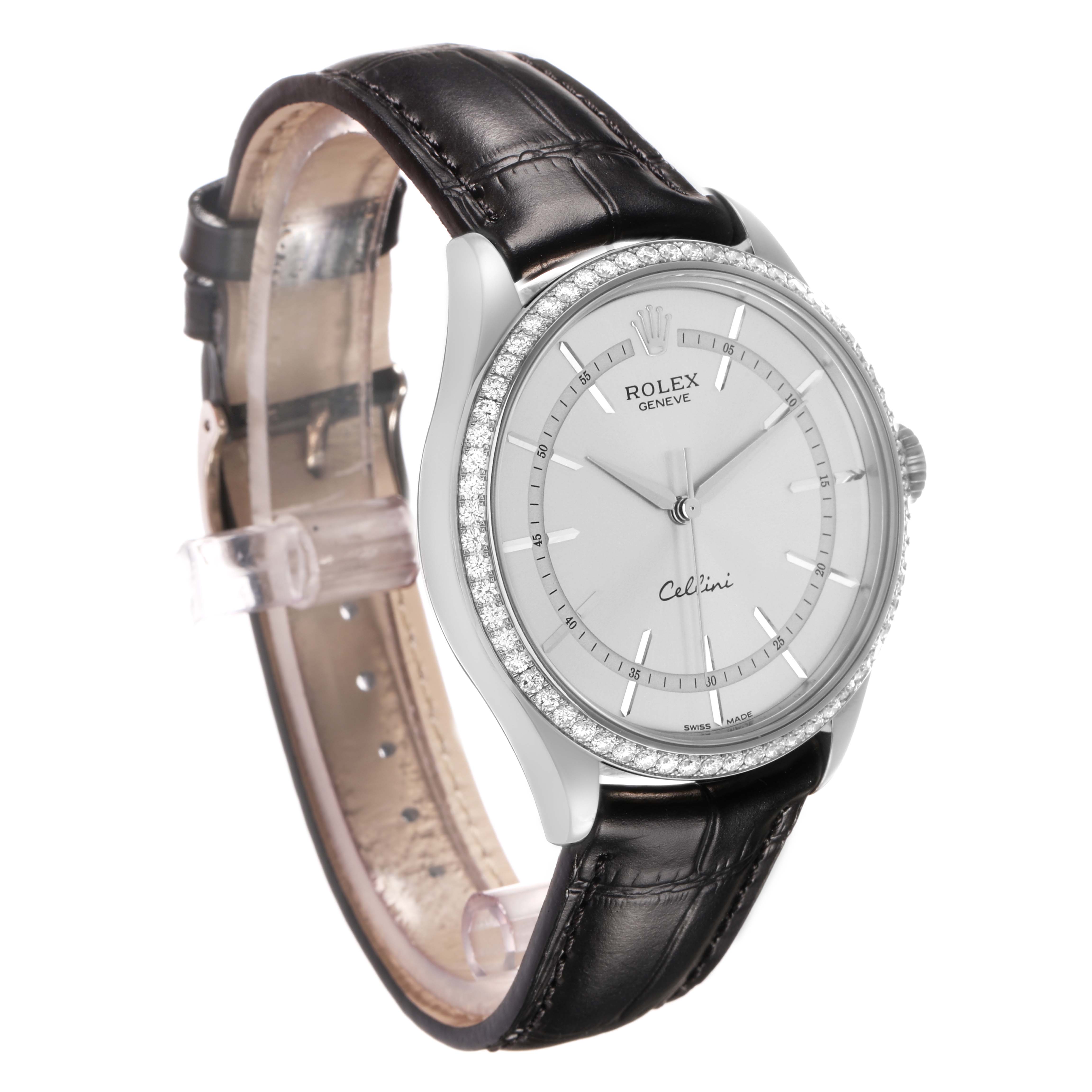 The Rolex Cellini 50709 Men's White Gold Silver Dial watch is shown from a front-left angle, highlighting the dial, bezel, and leather strap.