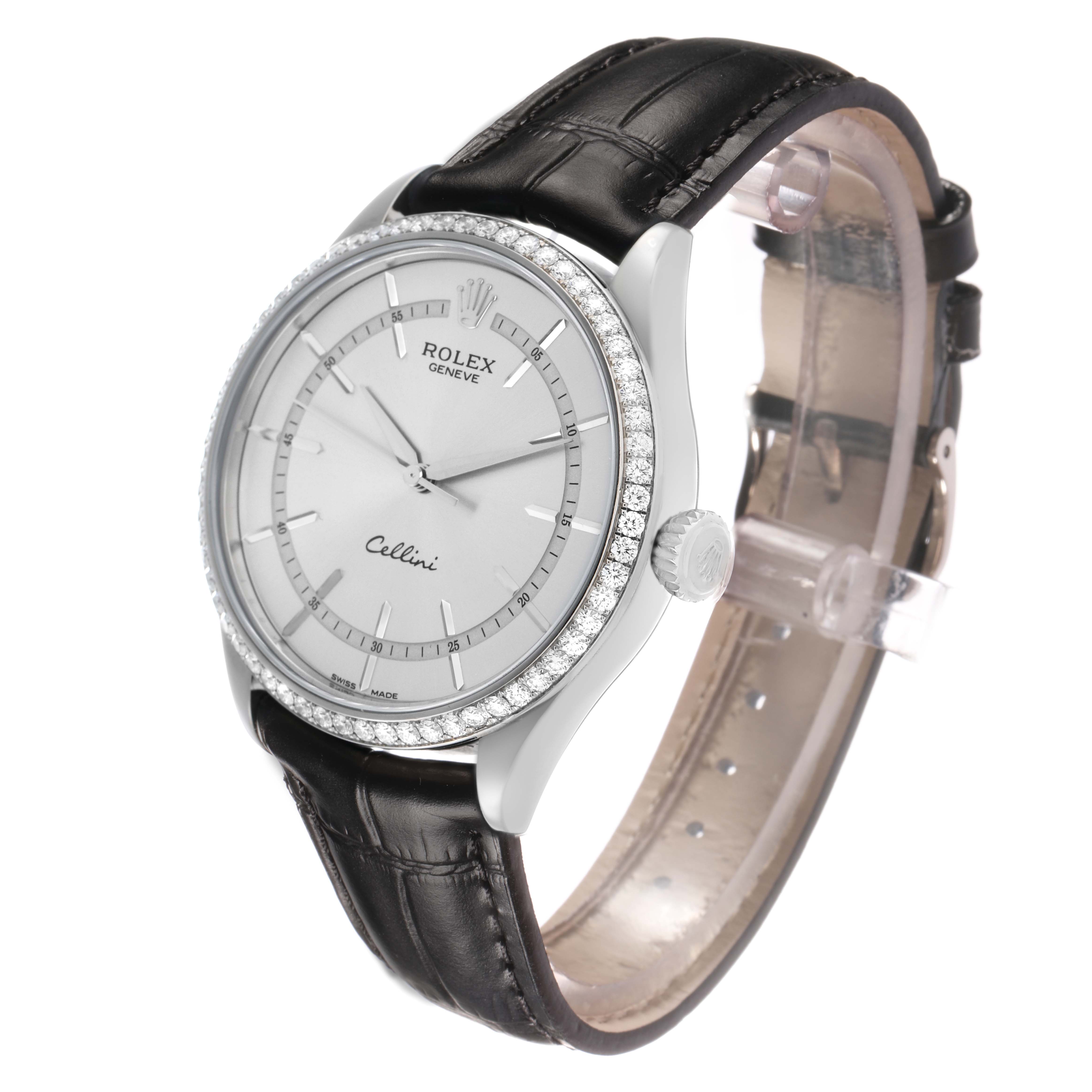 The Rolex Cellini 50709 Men's White Gold Silver Dial watch is shown at a slight angle, highlighting its face, bezel, crown, and leather strap.