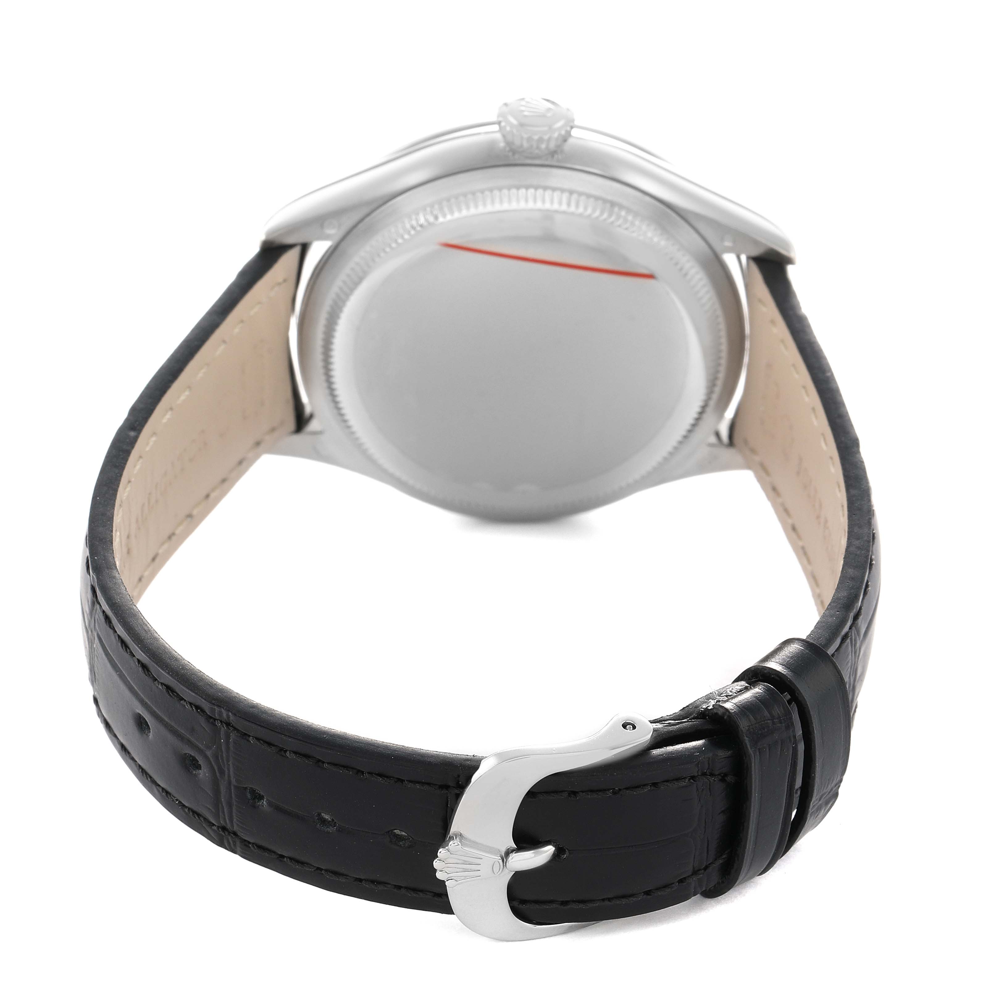 The Rolex Cellini 50709 Men's White Gold Silver Dial watch is viewed from the back, showing the caseback, crown, and black leather strap with buckle.