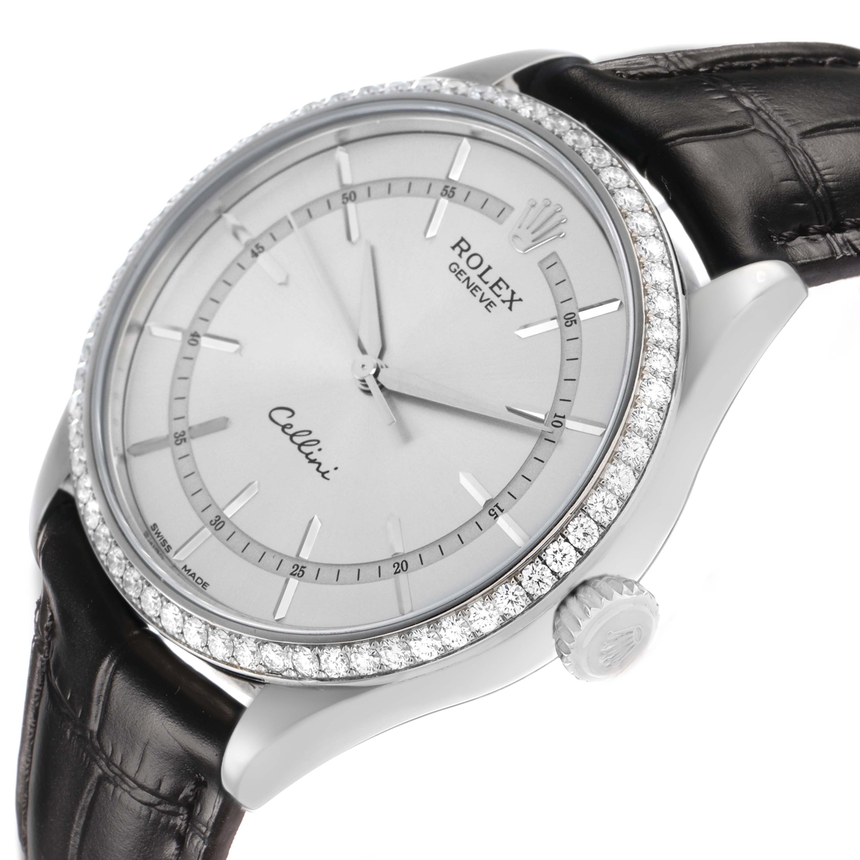 The Rolex Cellini 50709 Men's White Gold Silver Dial watch is shown at a tilted angle, highlighting the bezel, dial, crown, and leather strap.