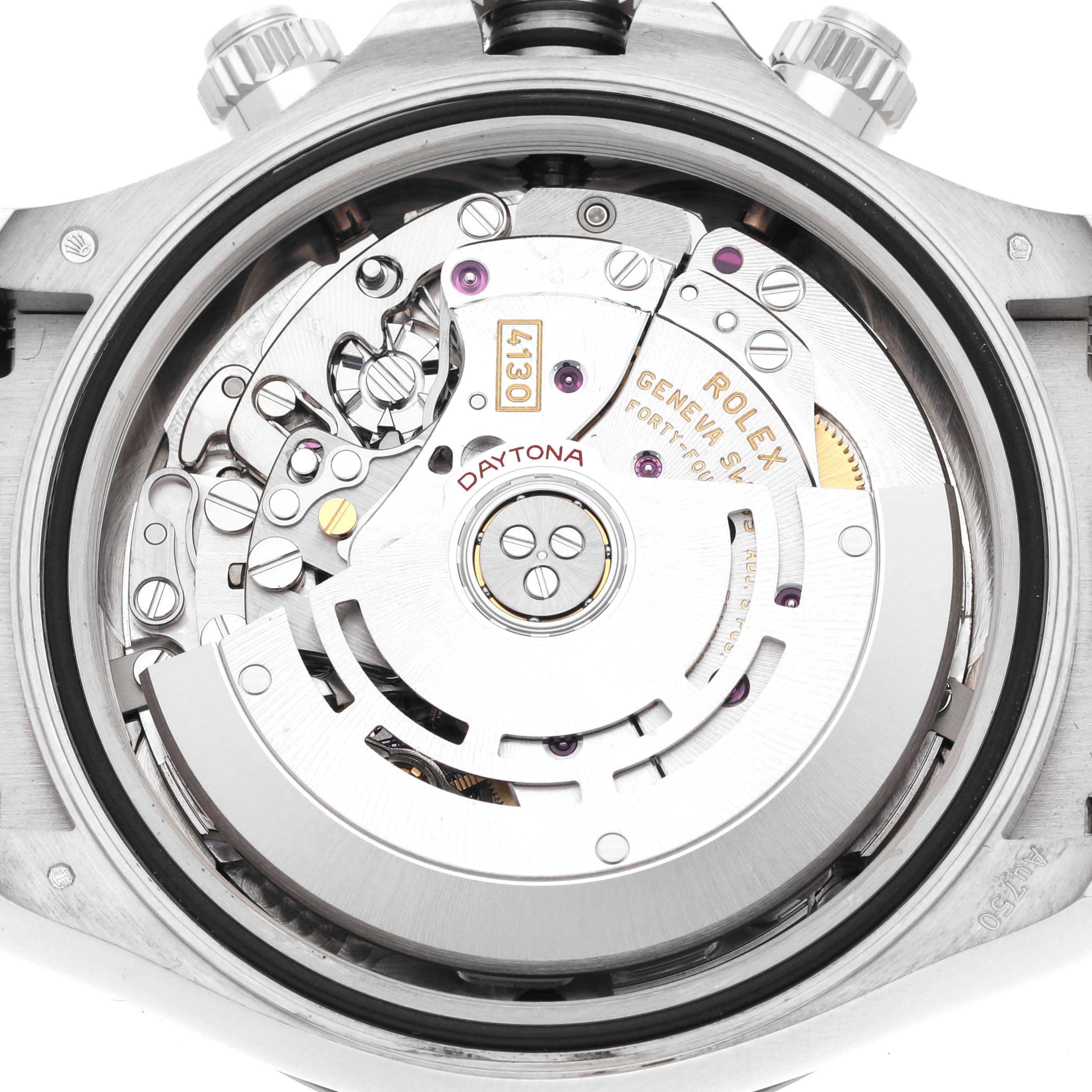 The image shows the inner mechanics of a Rolex Daytona 116519 Men's White Gold Black Dial 116519 Men's White Gold Black Dial watch from a back angle, revealing its intricate movement.