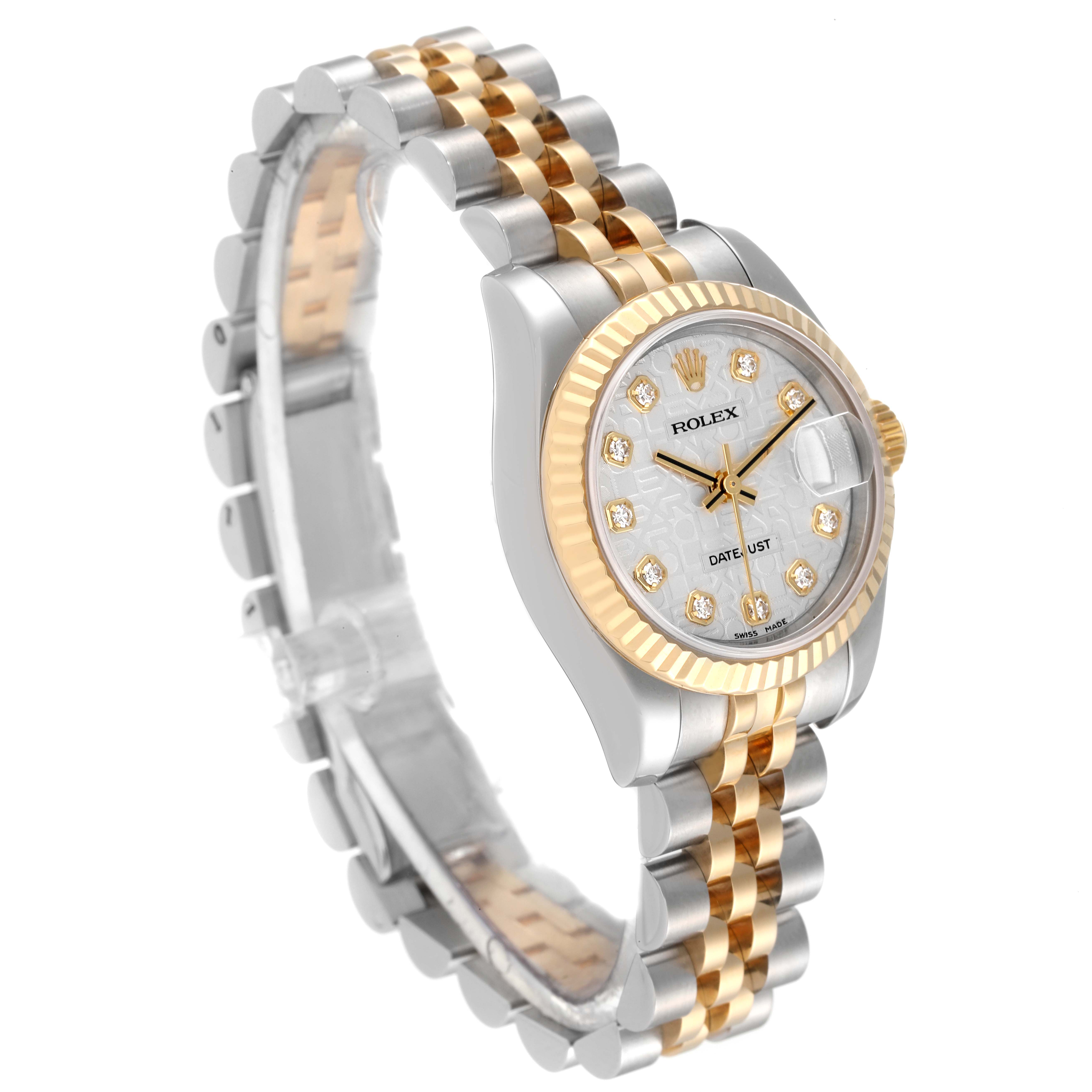 The Rolex Datejust 179173 Women's Steel and Gold (two tone) Silver Dial 179173 Women's Steel and Gold (two tone) Silver Dial watch is shown at a three-quarter angle, highlighting its jubilee bracelet, fluted bezel, and diamond hour markers.