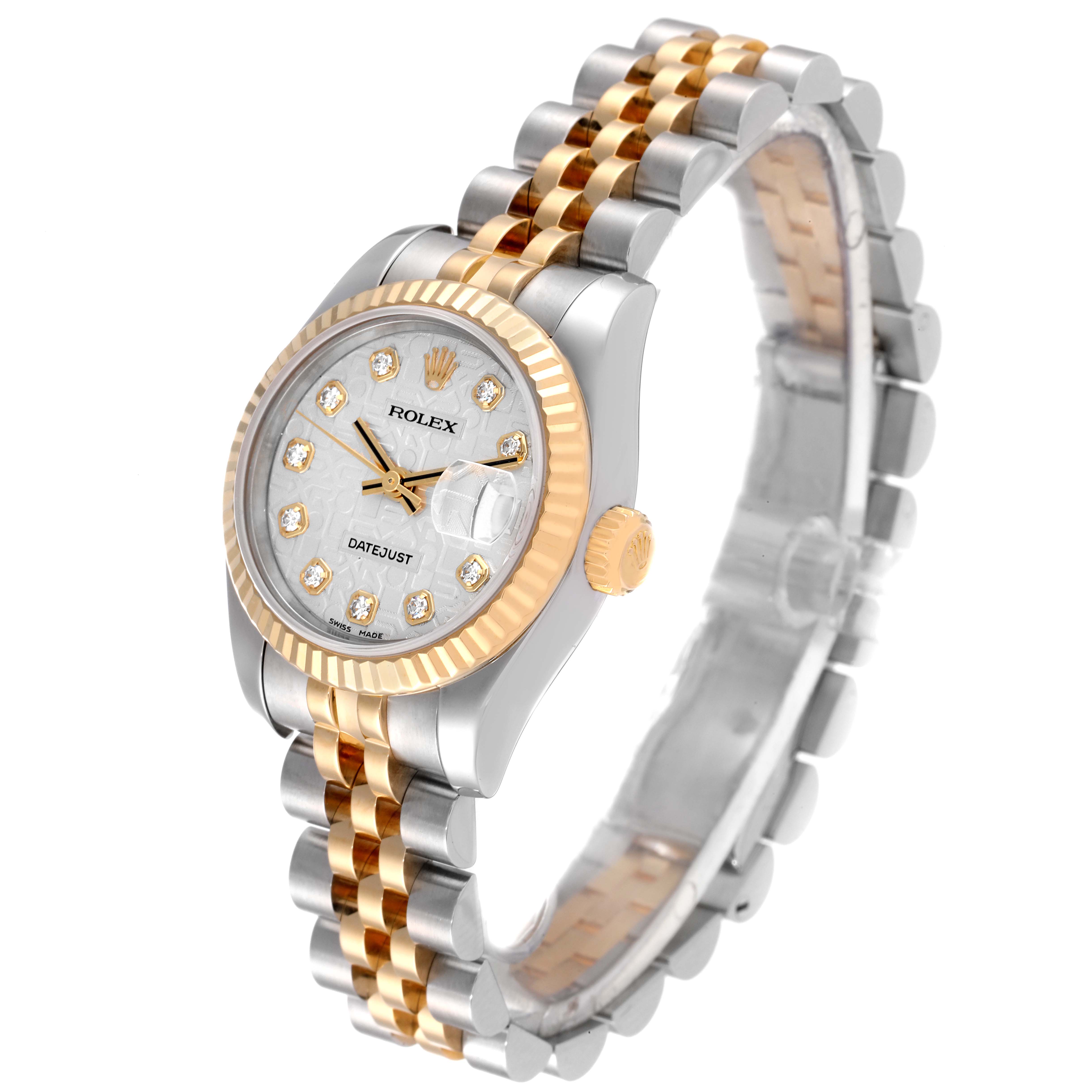The image shows a Rolex Datejust 179173 Women's Steel and Gold (two tone) Silver Dial 179173 Women's Steel and Gold (two tone) Silver Dial watch from a front-side angle, highlighting the face, bezel, crown, and bracelet.