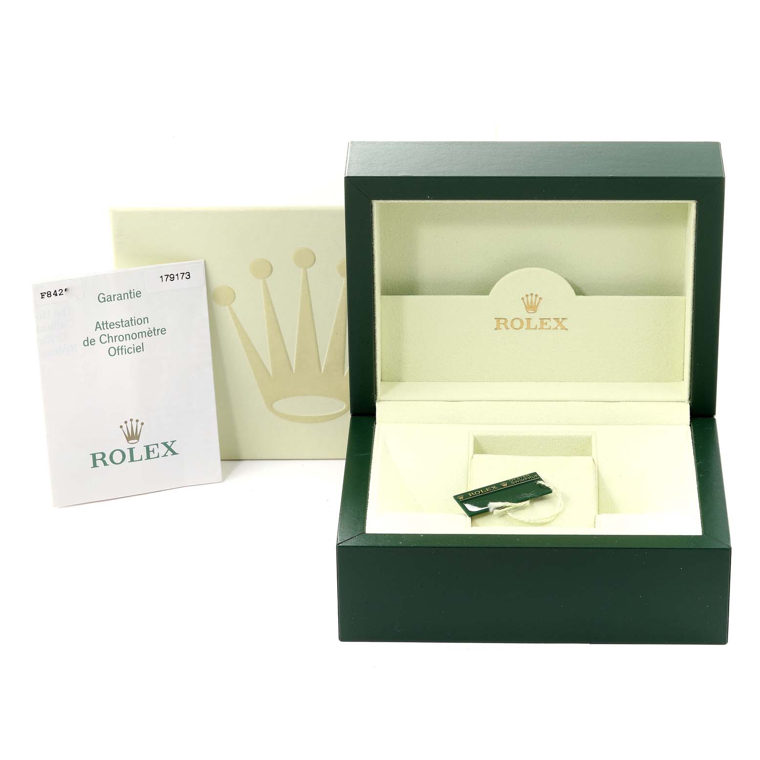 The image shows an open Rolex Datejust 179173 Women's Steel and Gold (two tone) Silver Dial 179173 Women's Steel and Gold (two tone) Silver Dial watch box with warranty papers and a tag inside.