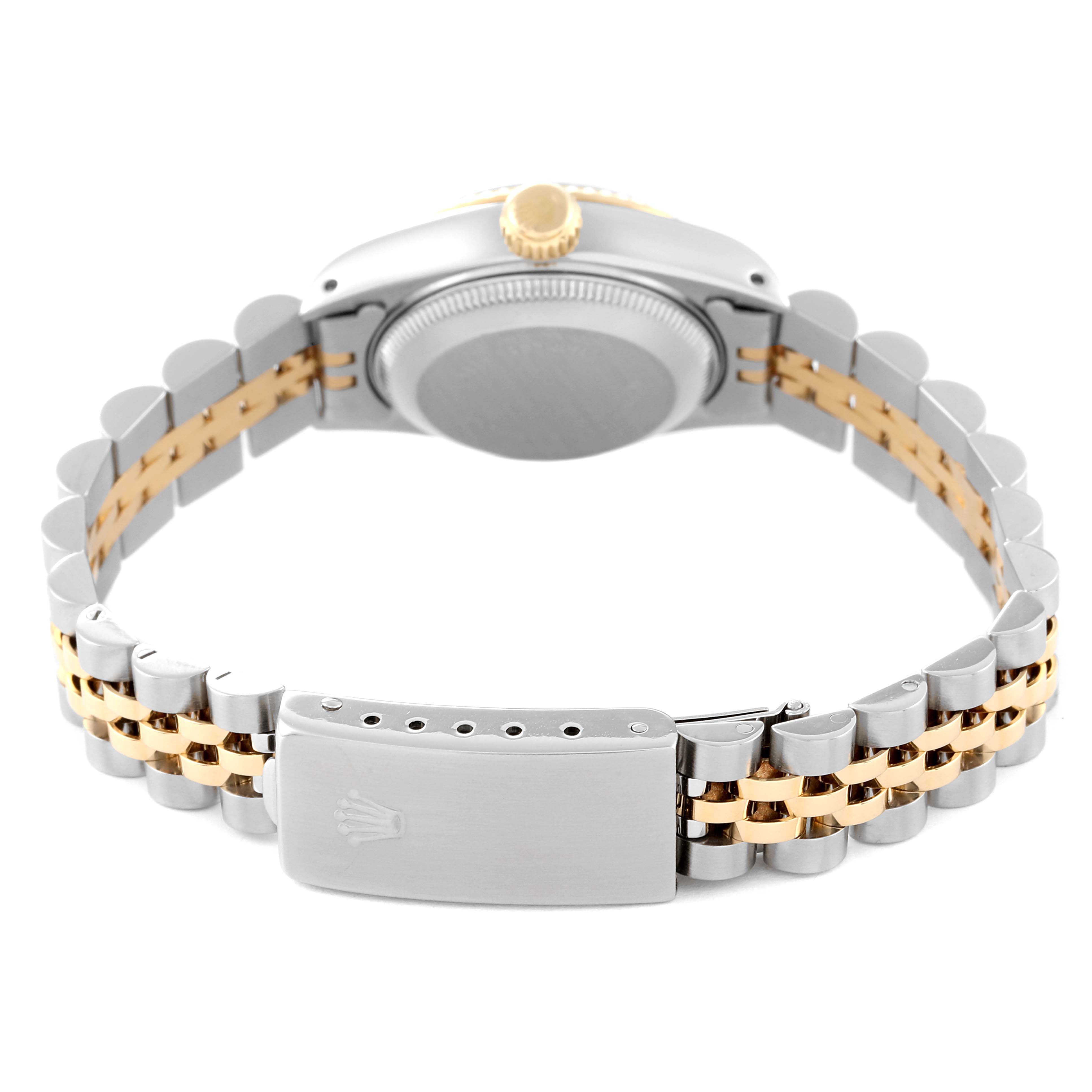 This image shows the back side of a Rolex Datejust 69173 Women's Steel and Gold (two tone) Blue Dial 69173 Women's Steel and Gold (two tone) Blue Dial watch, showcasing its case back and two-tone bracelet with the clasp.