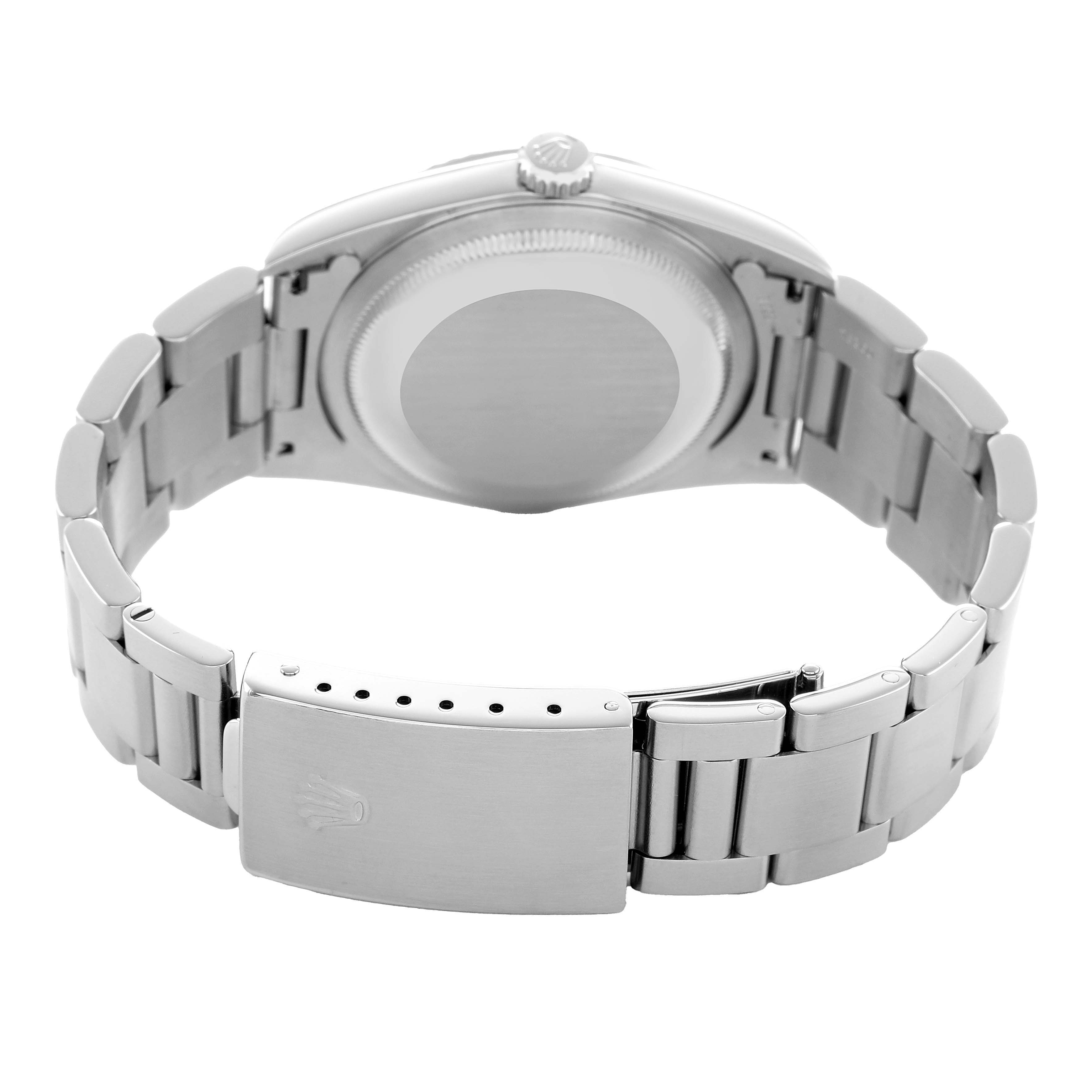 The image shows the back view of a Rolex Datejust 16234 Men's Stainless Steel Pink Dial watch, highlighting the closed clasp and bracelet links.