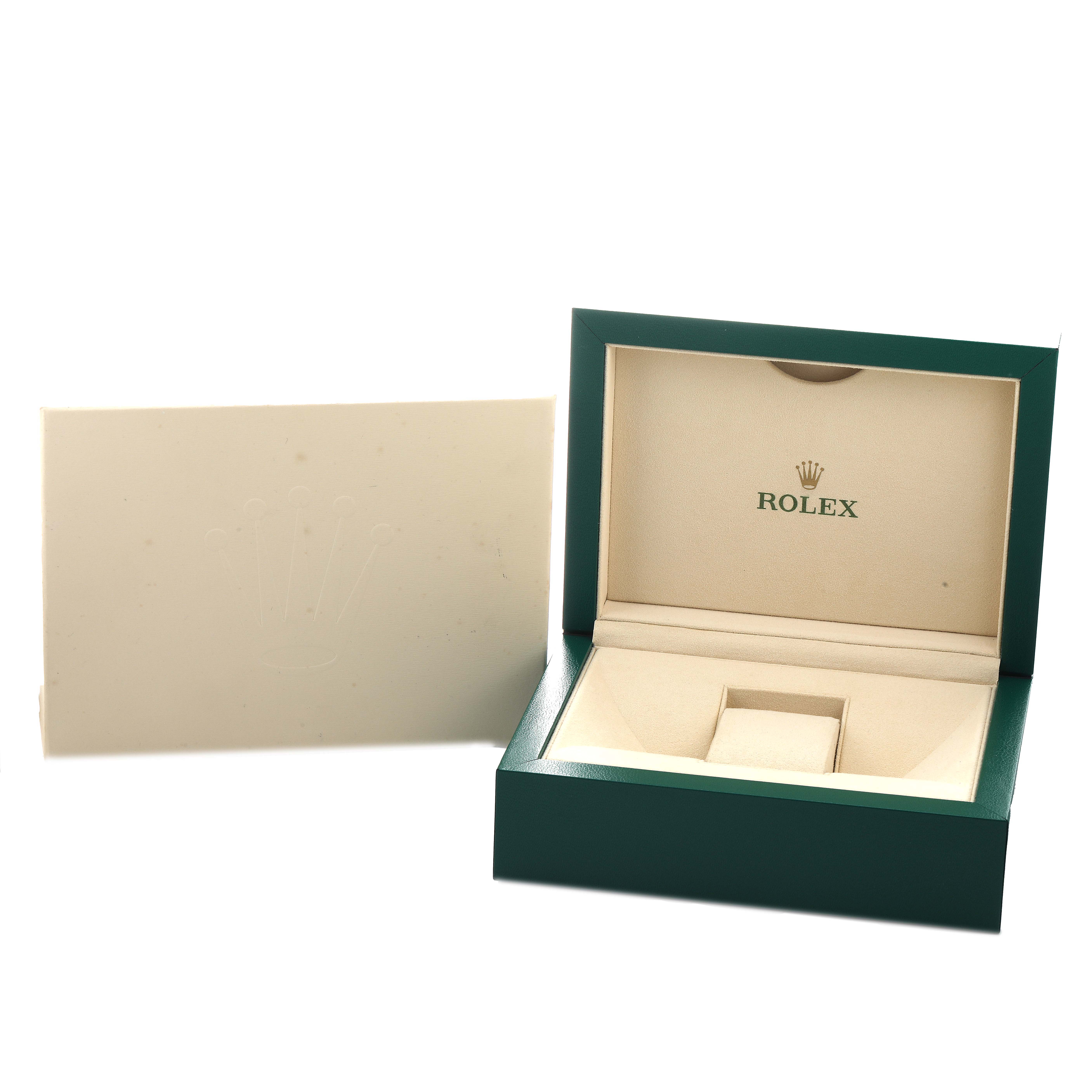 The image shows an open green and beige Rolex box with a card, designed for the Datejust 41 model.