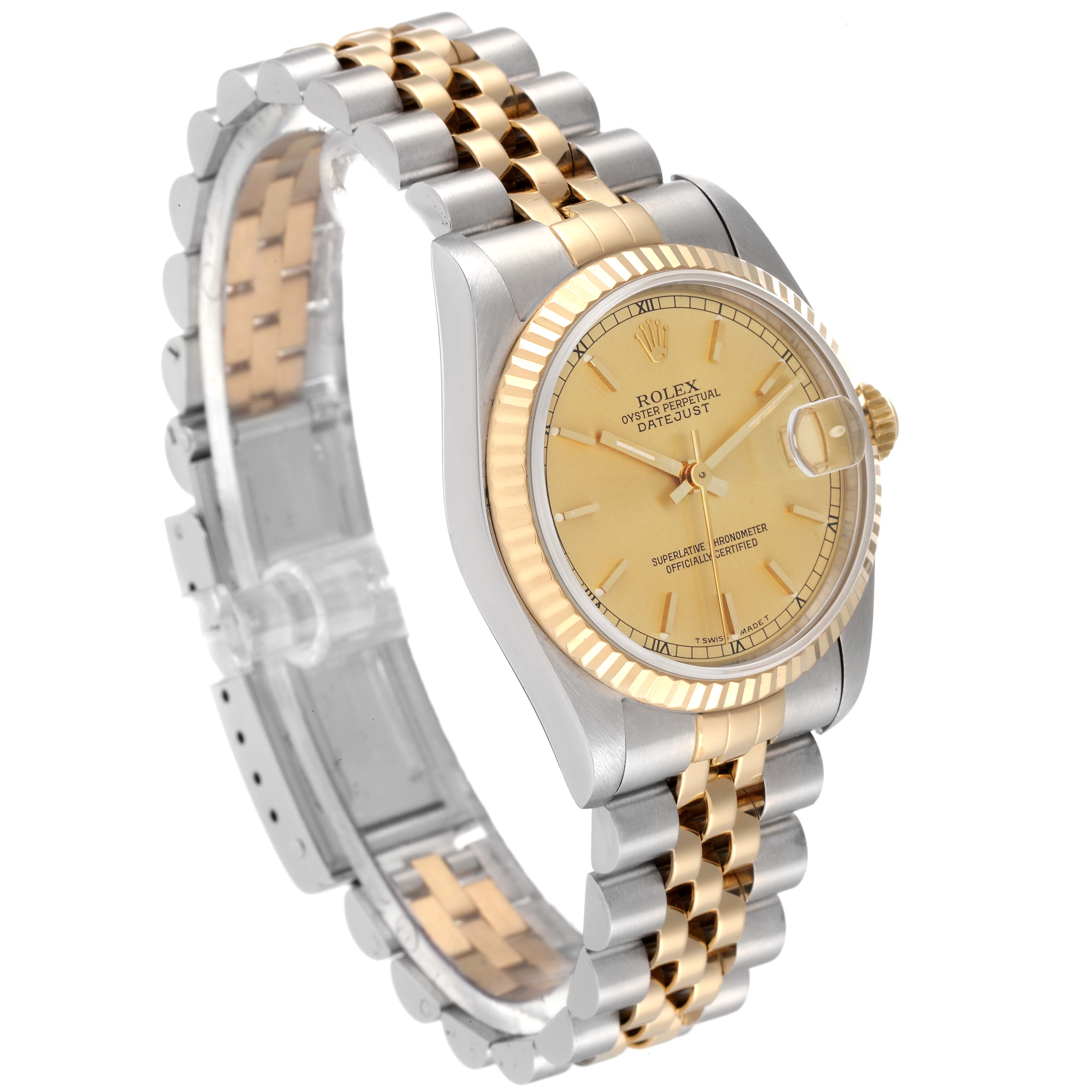 The image shows a Rolex Mid-Size 68273 Women
s Steel and Gold (two tone) Champagne Dial 68273 Women
s Steel and Gold (two tone) Champagne Dial Oyster Perpetual Datejust watch from a front diagonal angle, highlighting the dial, case, and bracelet.