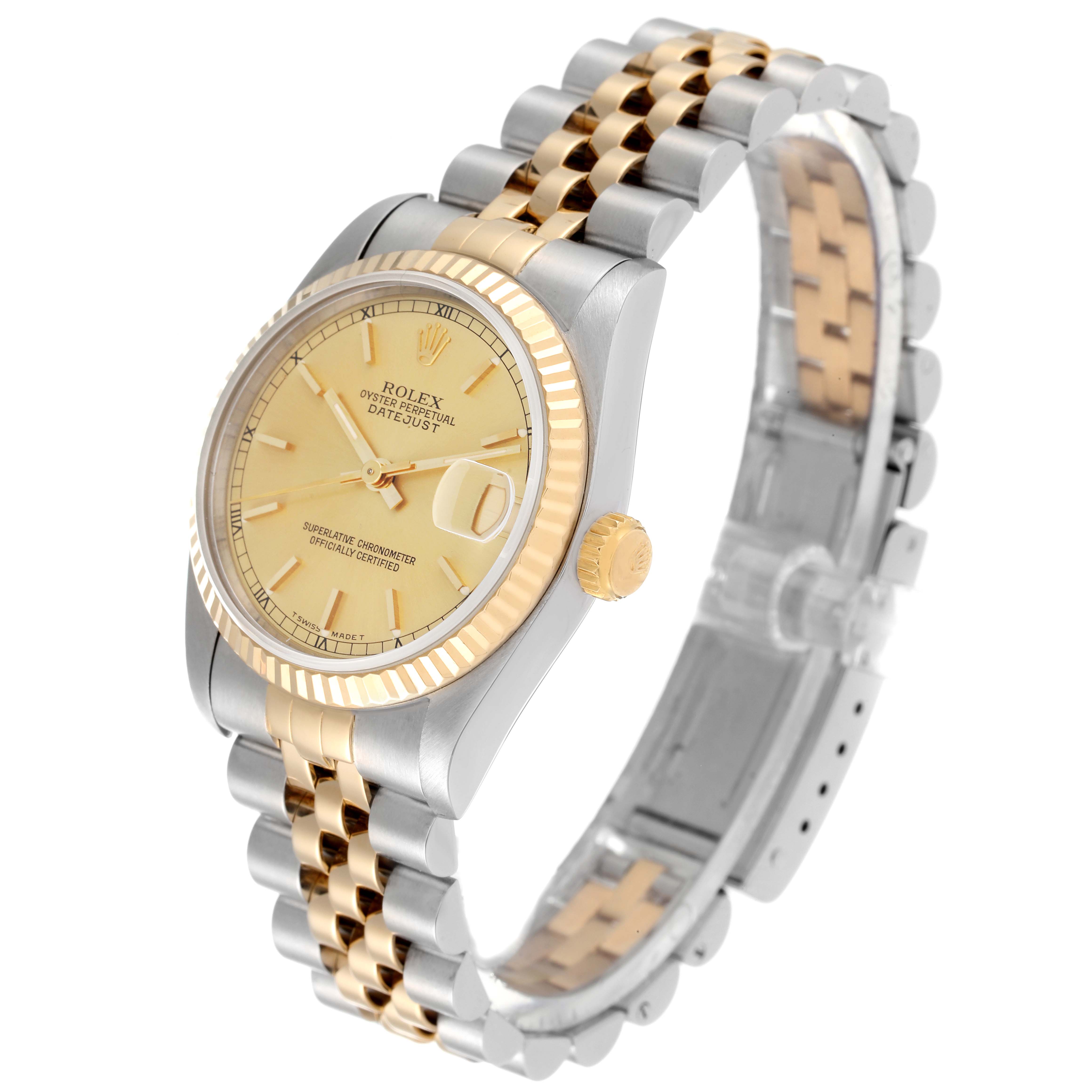 The Rolex Mid-Size 68273 Women
s Steel and Gold (two tone) Champagne Dial 68273 Women
s Steel and Gold (two tone) Champagne Dial Datejust watch is shown at an angle displaying its face, bezel, crown, and jubilee bracelet.