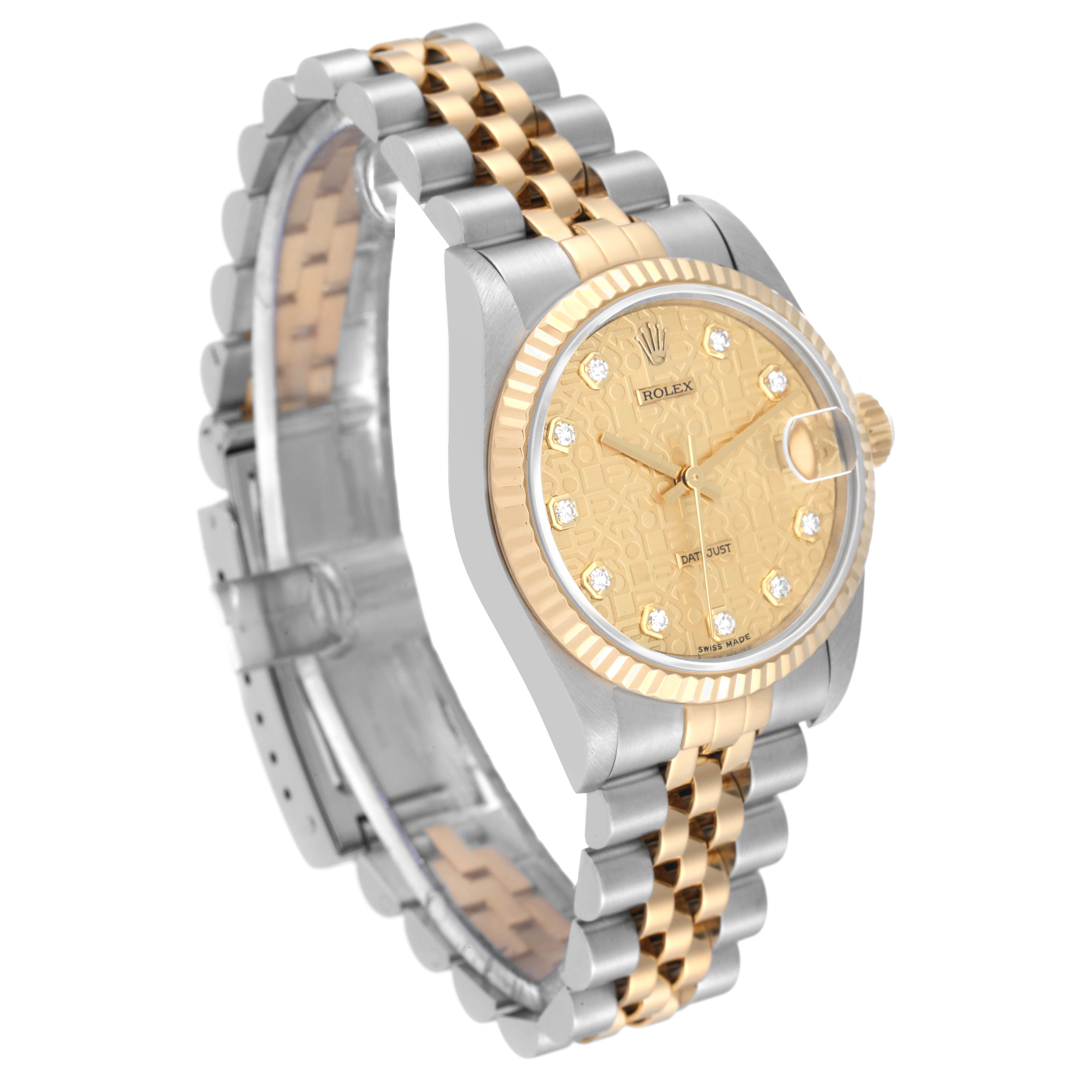 This image shows a Rolex Mid-Size 78273 Women
s Steel and Gold (two tone) Champagne Dial 78273 Women
s Steel and Gold (two tone) Champagne Dial Datejust watch with a two-tone metal bracelet and a champagne dial, captured at an angled side view.