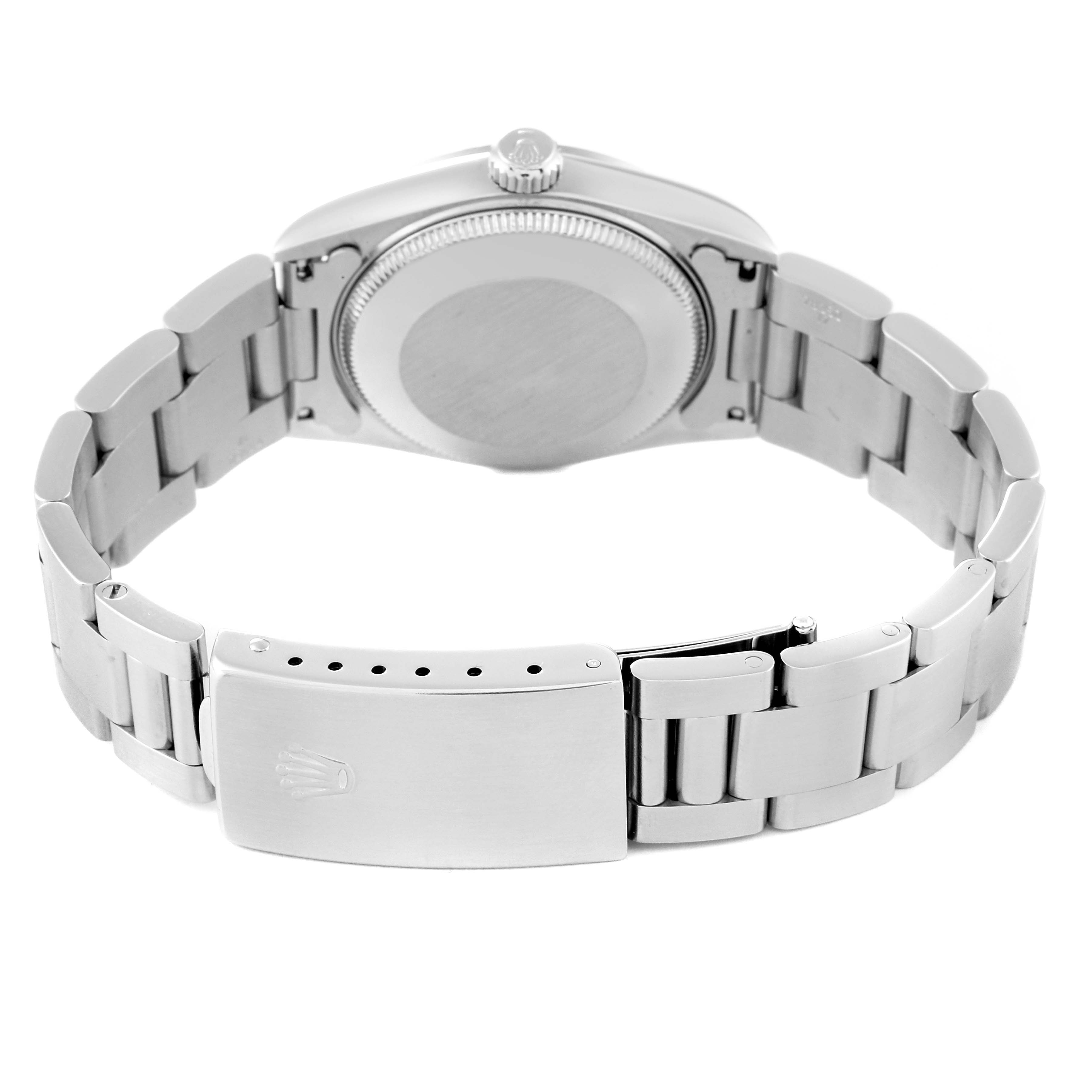 The image displays the backside and clasp of a Rolex Mid-Size 68240 Women
s Stainless Steel White Dial 68240 Women
s Stainless Steel White Dial watch, shown from a centered, rear angle.