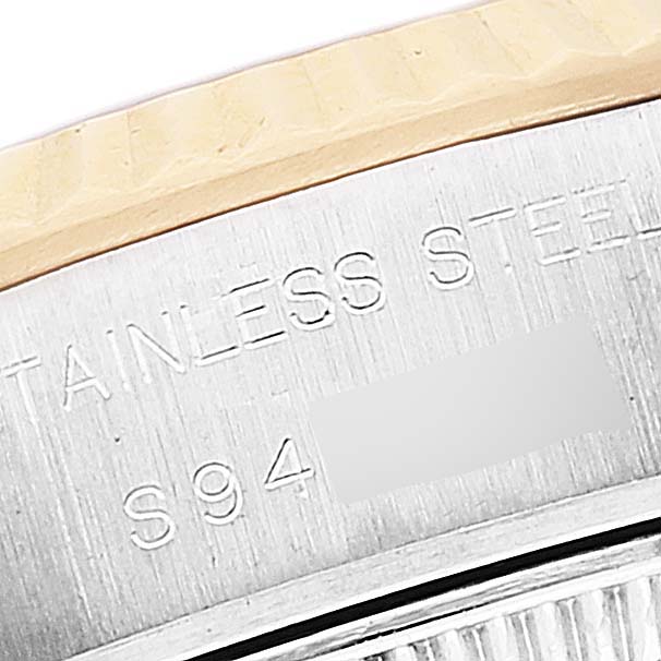 This close-up shows the stainless steel case and bezel edge of a Rolex Datejust 69173 Women's Steel and Gold (two tone) Silver Dial 69173 Women's Steel and Gold (two tone) Silver Dial watch.