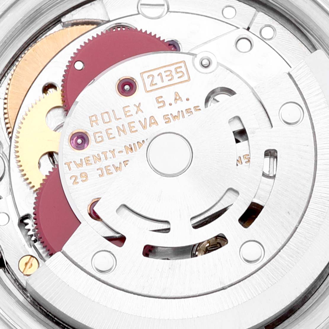 The image shows a close-up of the internal movement mechanism of a Rolex Datejust 69173 Women
s Steel and Gold (two tone) Grey Dial 69173 Women
s Steel and Gold (two tone) Grey Dial watch.