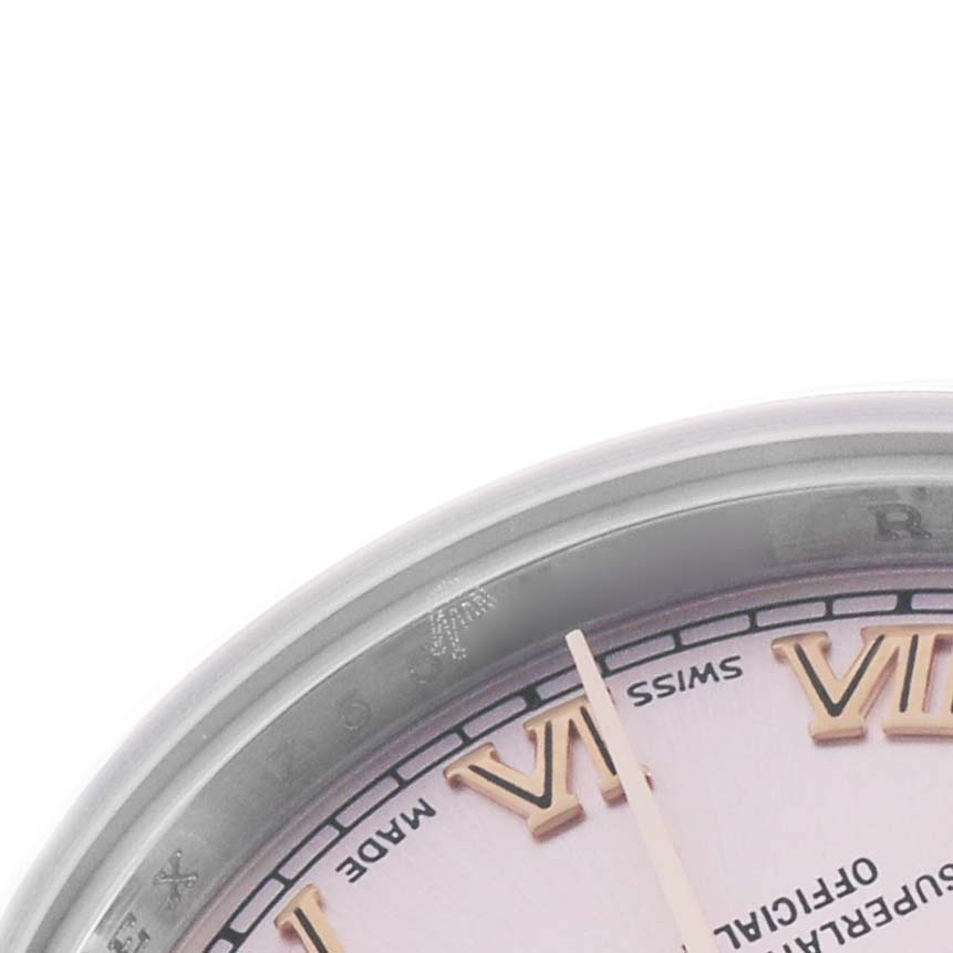 The image shows a partial view of the Rolex Datejust 179161 Women's Steel and Gold (two tone) Pink Dial watch, focusing on the bezel and part of the dial with Roman numerals.