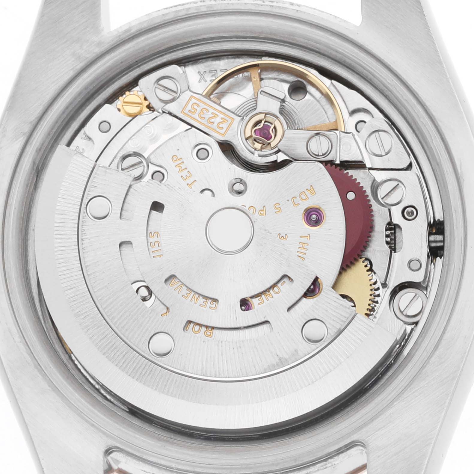 The image shows the movement mechanism of a Rolex Datejust 179161 Women's Steel and Gold (two tone) Pink Dial, viewed from the back, highlighting gears and rotors.