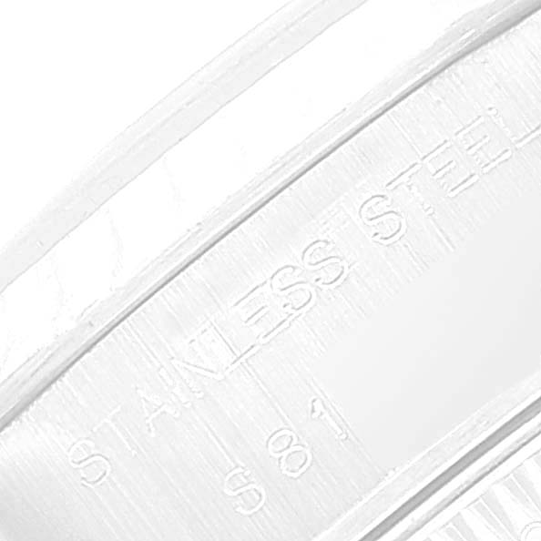 The image shows a close-up view of the stainless steel text on the Rolex Datejust 69174 Women's Stainless Steel Blue Dial 69174 Women's Stainless Steel Blue Dial model.