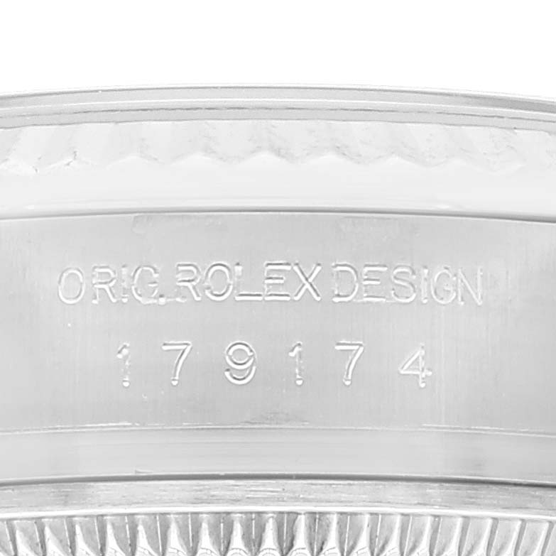 This close-up image shows the engraved model number and design identifier on the side of the Rolex Datejust 179174 Women's Stainless Steel Blue Dial 179174 Women's Stainless Steel Blue Dial watch.