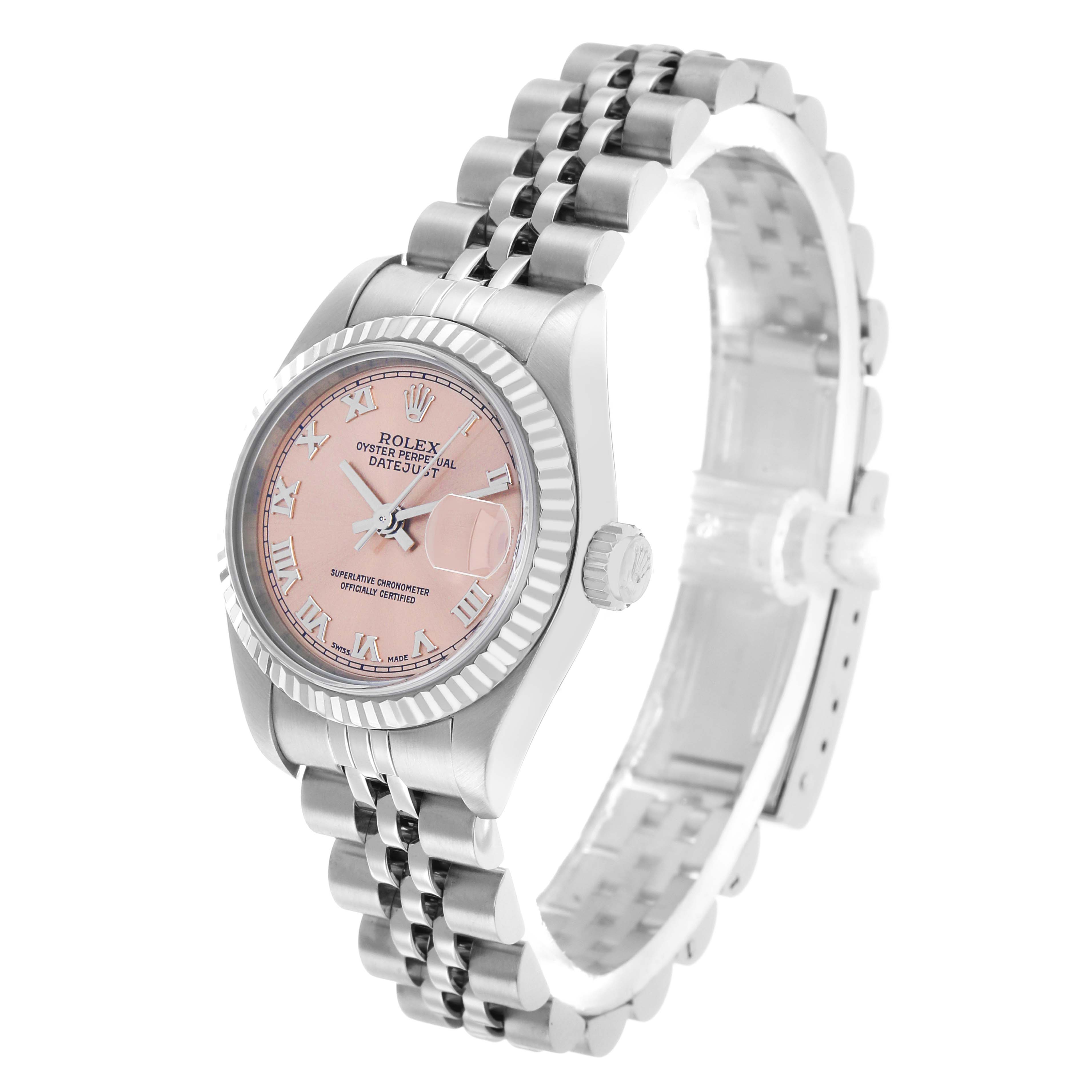 The Rolex Datejust 79174 Women's Stainless Steel Pink Dial watch is shown at an angled side view highlighting the pink dial, fluted bezel, and Jubilee bracelet.
