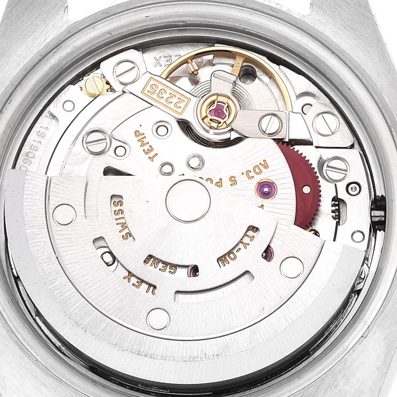 The image shows the internal mechanism of the Rolex Datejust 179174 Women's Stainless Steel Silver Dial 179174 Women's Stainless Steel Silver Dial watch from a close-up angle, featuring its intricate components.