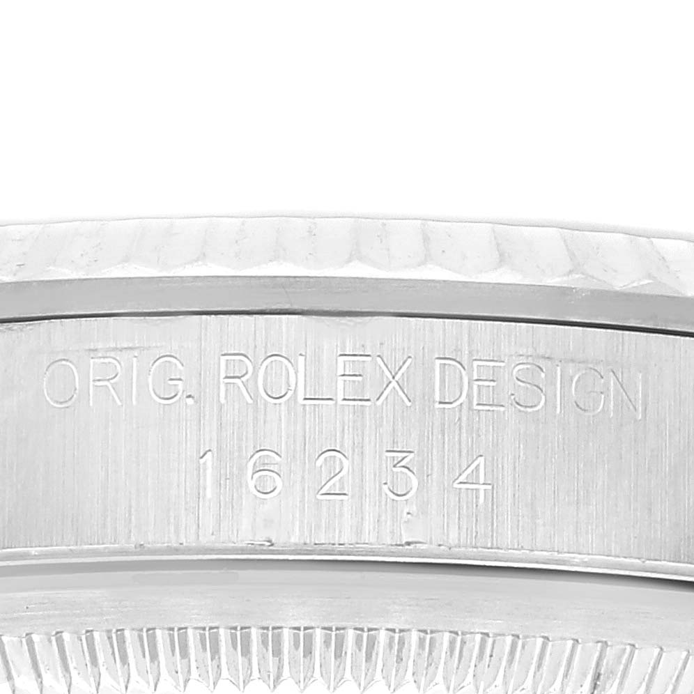 This image shows the side engraving of a Rolex Datejust 16234 Men's Stainless Steel Silver Dial 16234 Men's Stainless Steel Silver Dial watch, displaying the model number 16234.
