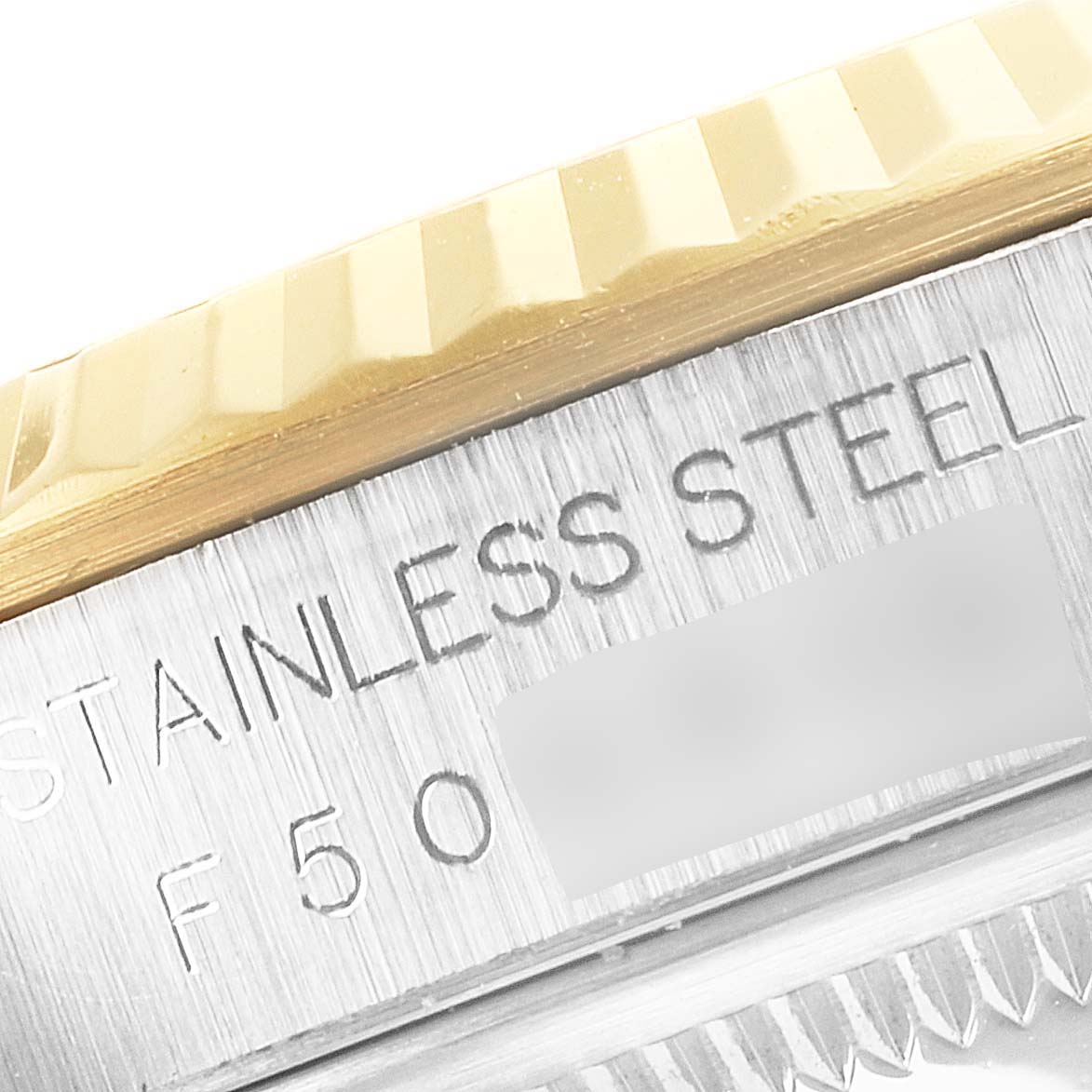 The image shows a close-up of the stainless steel casing and gold fluted bezel of a Rolex Datejust 16233 Men's Steel and Gold (two tone) Black Dial 16233 Men's Steel and Gold (two tone) Black Dial watch.