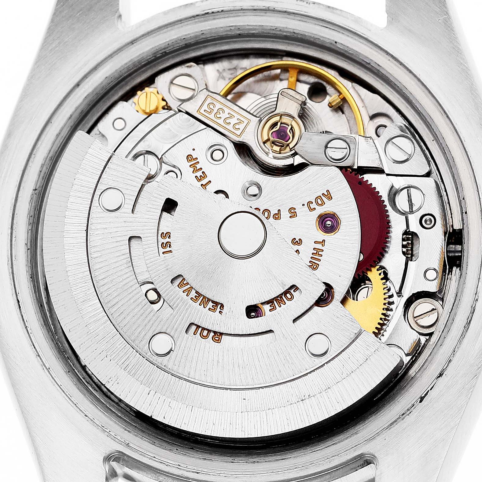 The image shows a close-up of the Rolex Datejust 179173 Women's Steel and Gold (two tone) Champagne Dial 179173 Women's Steel and Gold (two tone) Champagne Dial watch movement from the back, revealing its intricate internal mechanism.