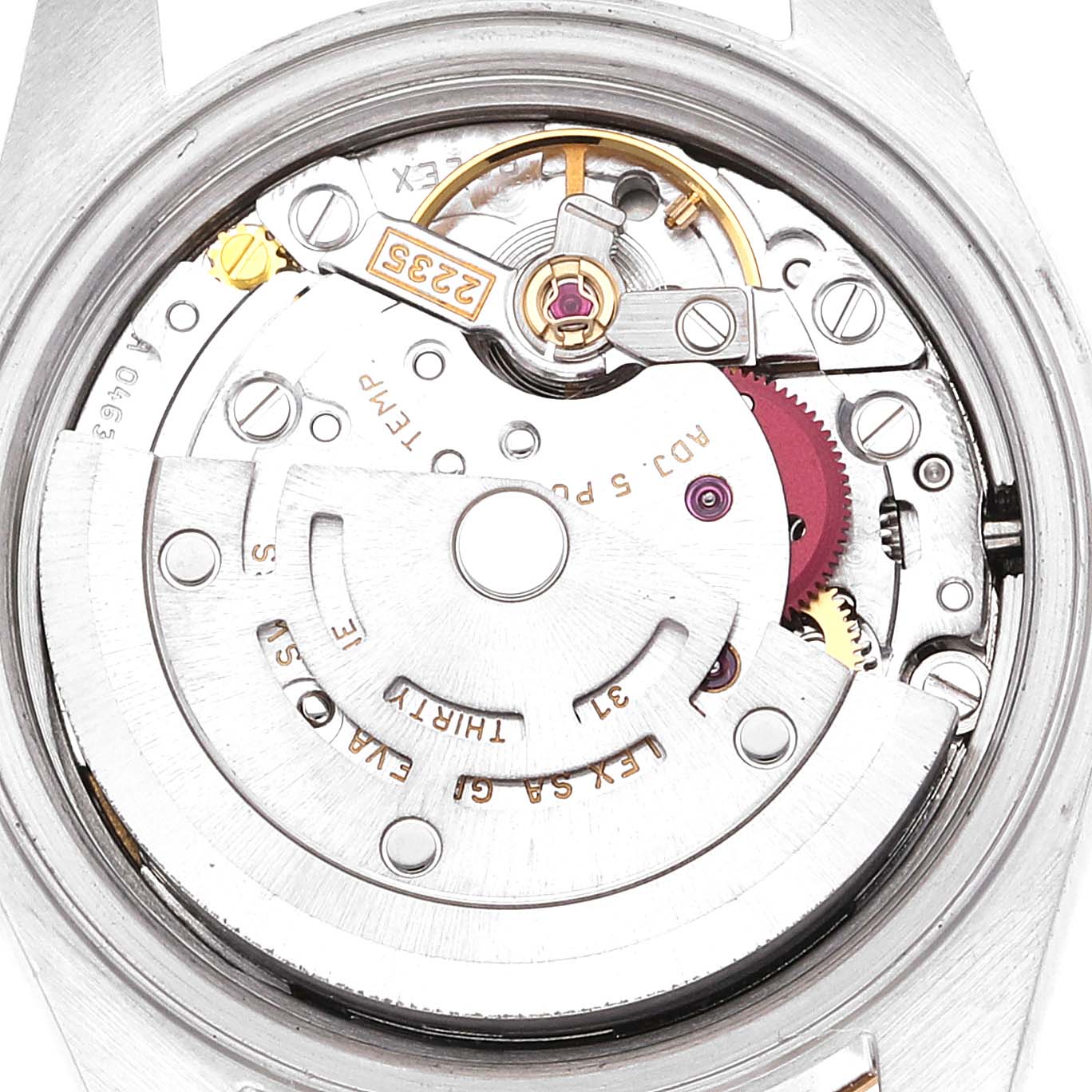 This is an interior view of a Rolex Datejust 79173 Women's Steel and Gold (two tone) Mother of Pearl Dial 79173 Women's Steel and Gold (two tone) Mother of Pearl Dial watch, showing its movement components and intricate mechanical parts.