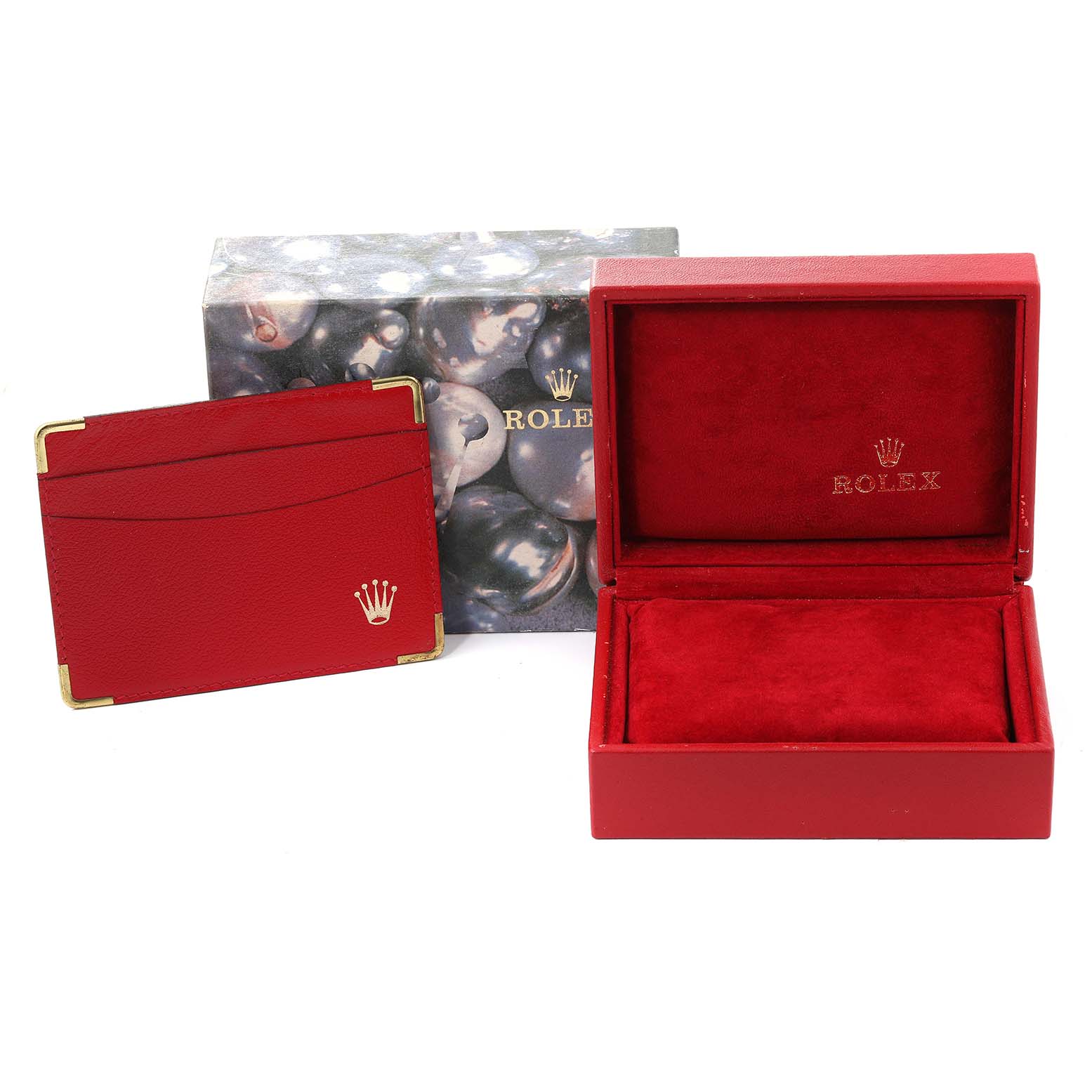 The image shows a red Rolex Datejust 79173 Women's Steel and Gold (two tone) Mother of Pearl Dial 79173 Women's Steel and Gold (two tone) Mother of Pearl Dial box with gold accents, a red leather cardholder, and an outer packaging box.