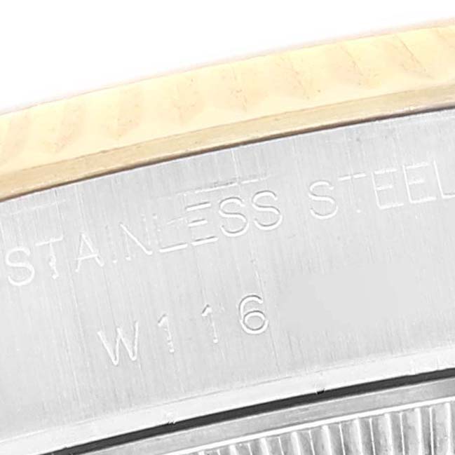 This image shows a close-up of the case back with "STAINLESS STEEL" text on a Rolex Datejust 69173 Women
s Steel and Gold (two tone) Grey Dial 69173 Women
s Steel and Gold (two tone) Grey Dial watch.