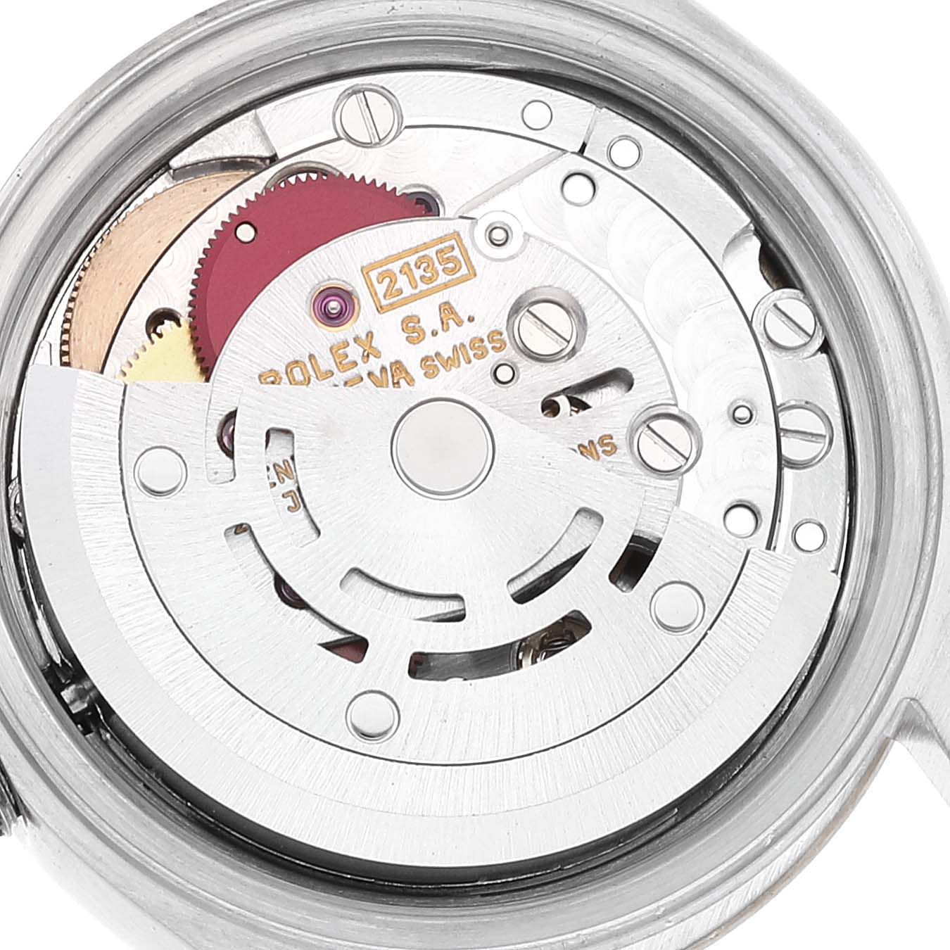 This image shows a close-up view of the movement mechanism of a Rolex Datejust 69173 Women
s Steel and Gold (two tone) Grey Dial 69173 Women
s Steel and Gold (two tone) Grey Dial watch, highlighting the intricate components and rotor.