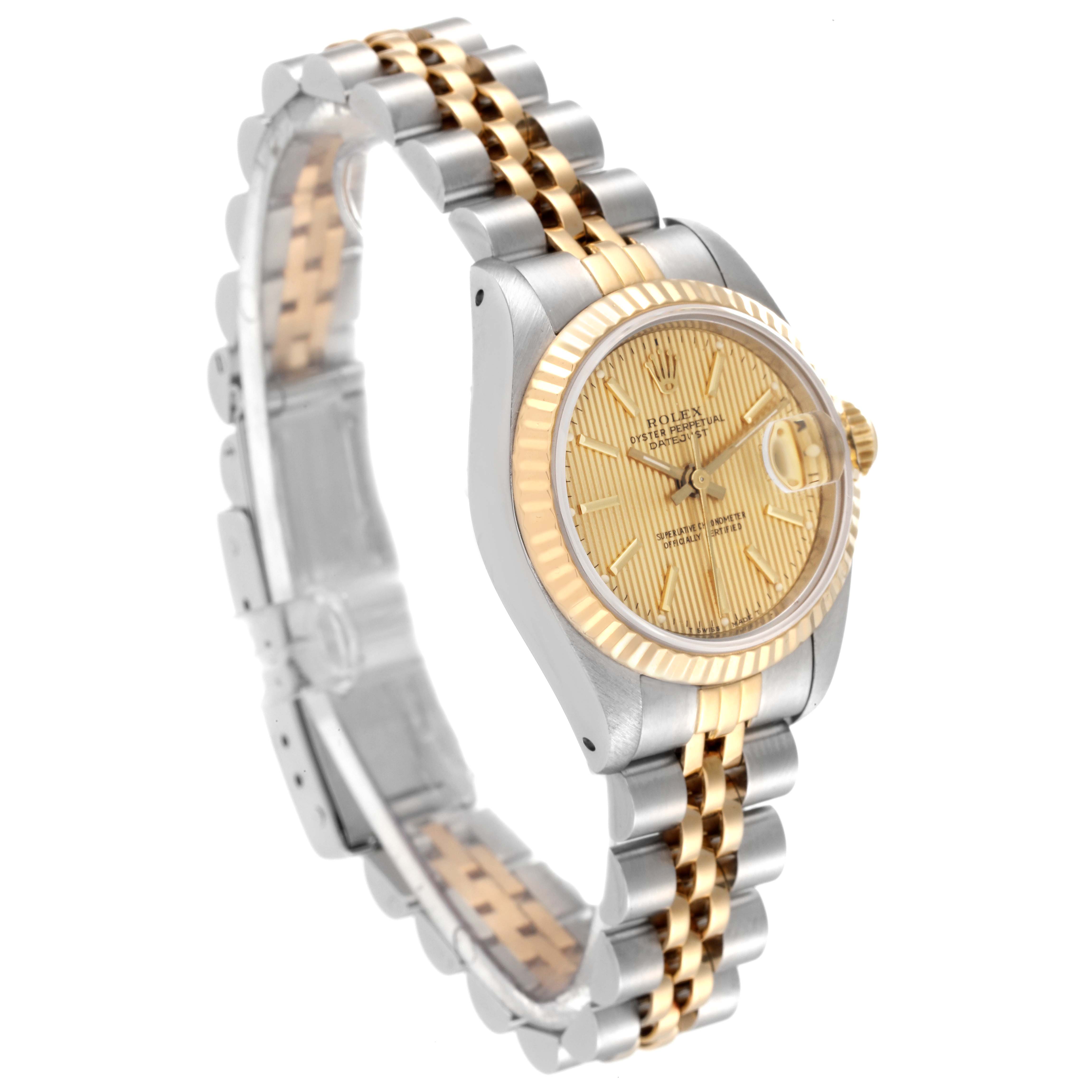 The Rolex Datejust 69173 Women's Steel and Gold (two tone) Champagne Dial 69173 Women's Steel and Gold (two tone) Champagne Dial watch is shown at a slight angle, highlighting the dial, bezel, and a partially extended two-tone Jubilee bracelet.