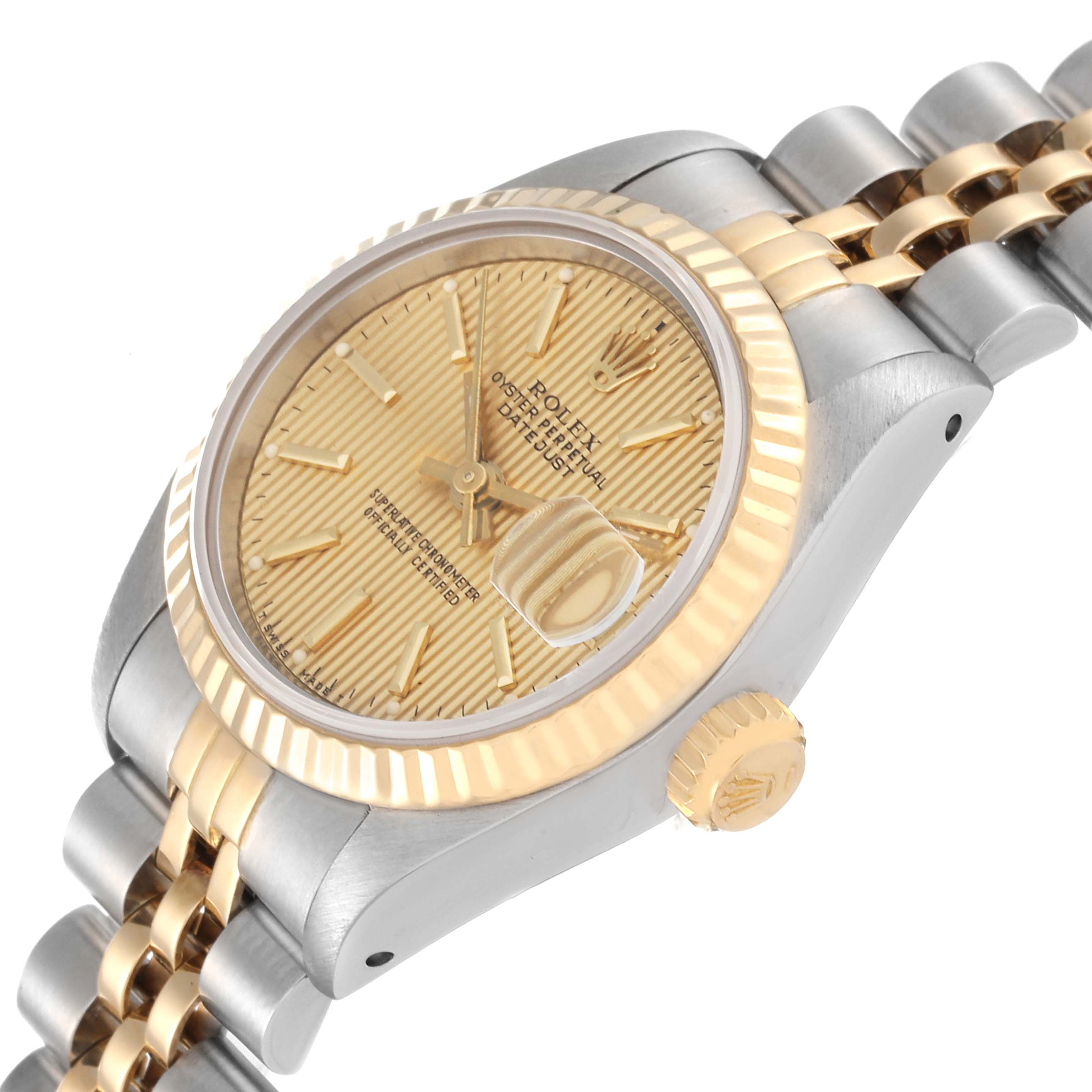 This image shows a side angle of the Rolex Datejust 69173 Women's Steel and Gold (two tone) Champagne Dial 69173 Women's Steel and Gold (two tone) Champagne Dial watch, highlighting its dial, bezel, and bracelet.