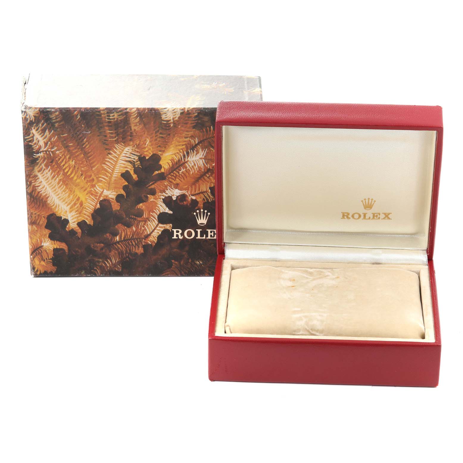 The image shows a Rolex Datejust 69173 Women's Steel and Gold (two tone) Champagne Dial 69173 Women's Steel and Gold (two tone) Champagne Dial watch's red display box and cardboard outer packaging.