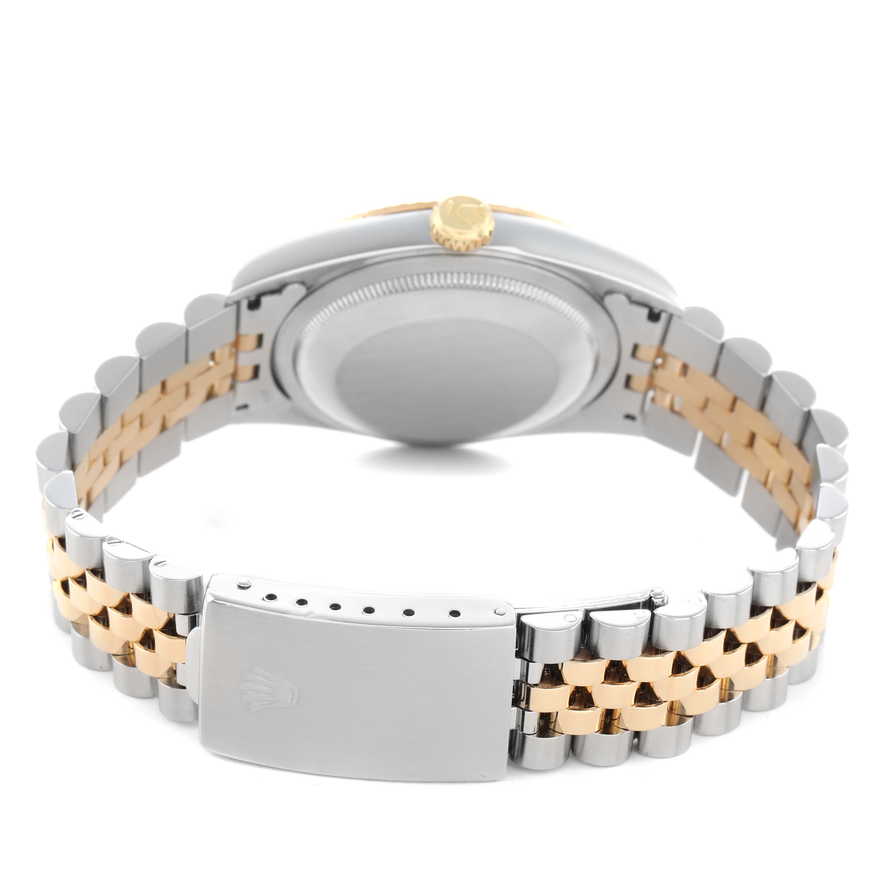 The image shows the back of a Rolex Datejust 16233 Men's Steel and Gold (two tone) Beige Dial watch, highlighting the clasp, bracelet, and crown from a rear angle.