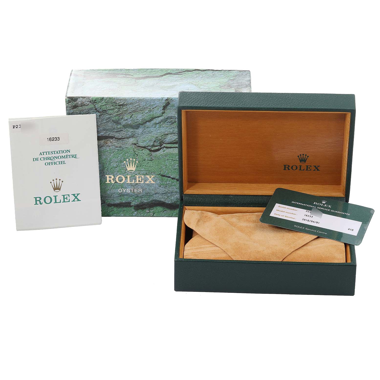 This image shows the packaging and accessories for a Rolex Datejust 16233 Men's Steel and Gold (two tone) Silver Dial 16233 Men's Steel and Gold (two tone) Silver Dial watch, including the outer box, inner box, manual, and service guarantee card.