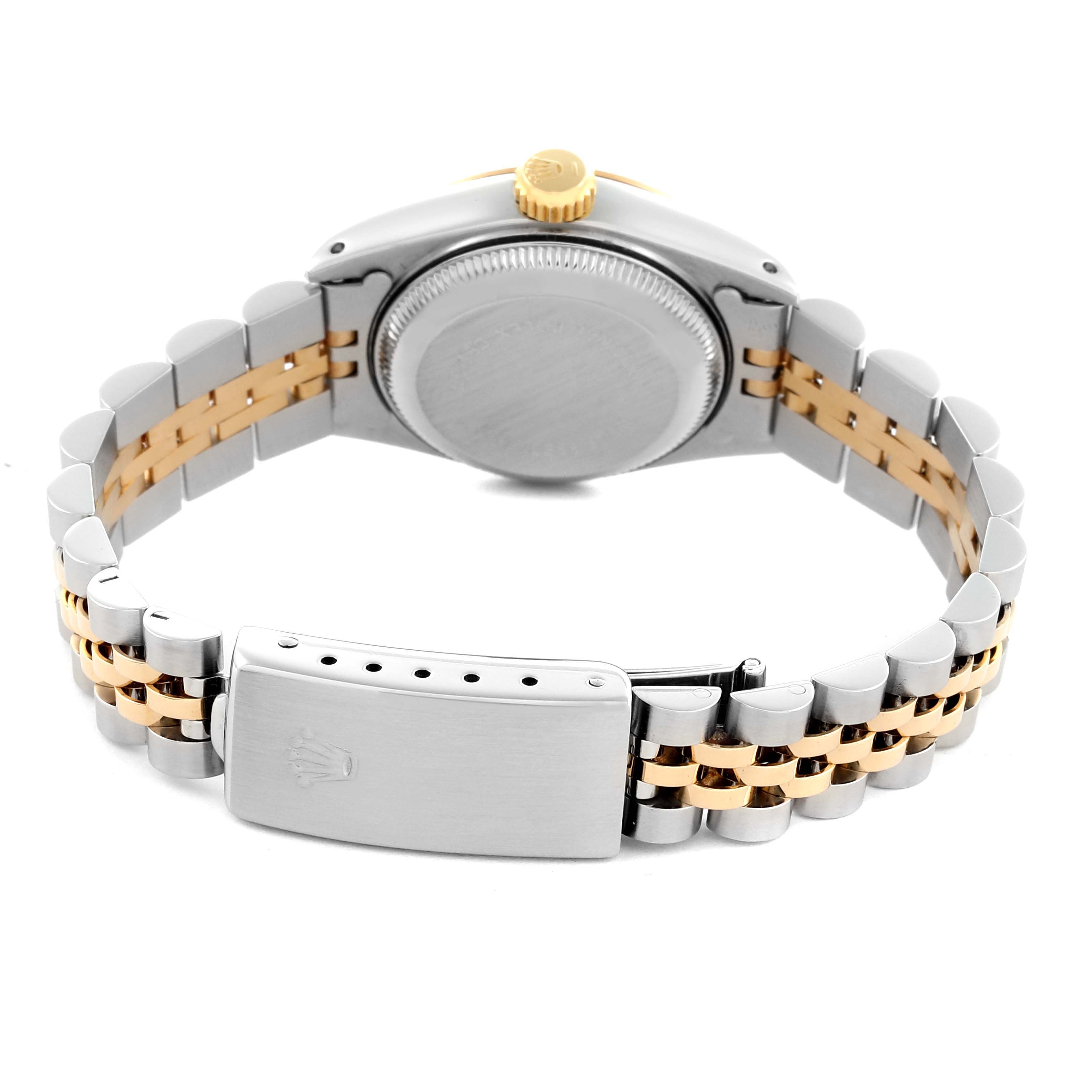 The Rolex Datejust 69173 Women's Steel and Gold (two tone) White Dial 69173 Women's Steel and Gold (two tone) White Dial is shown from the back, highlighting its two-tone bracelet and clasp.