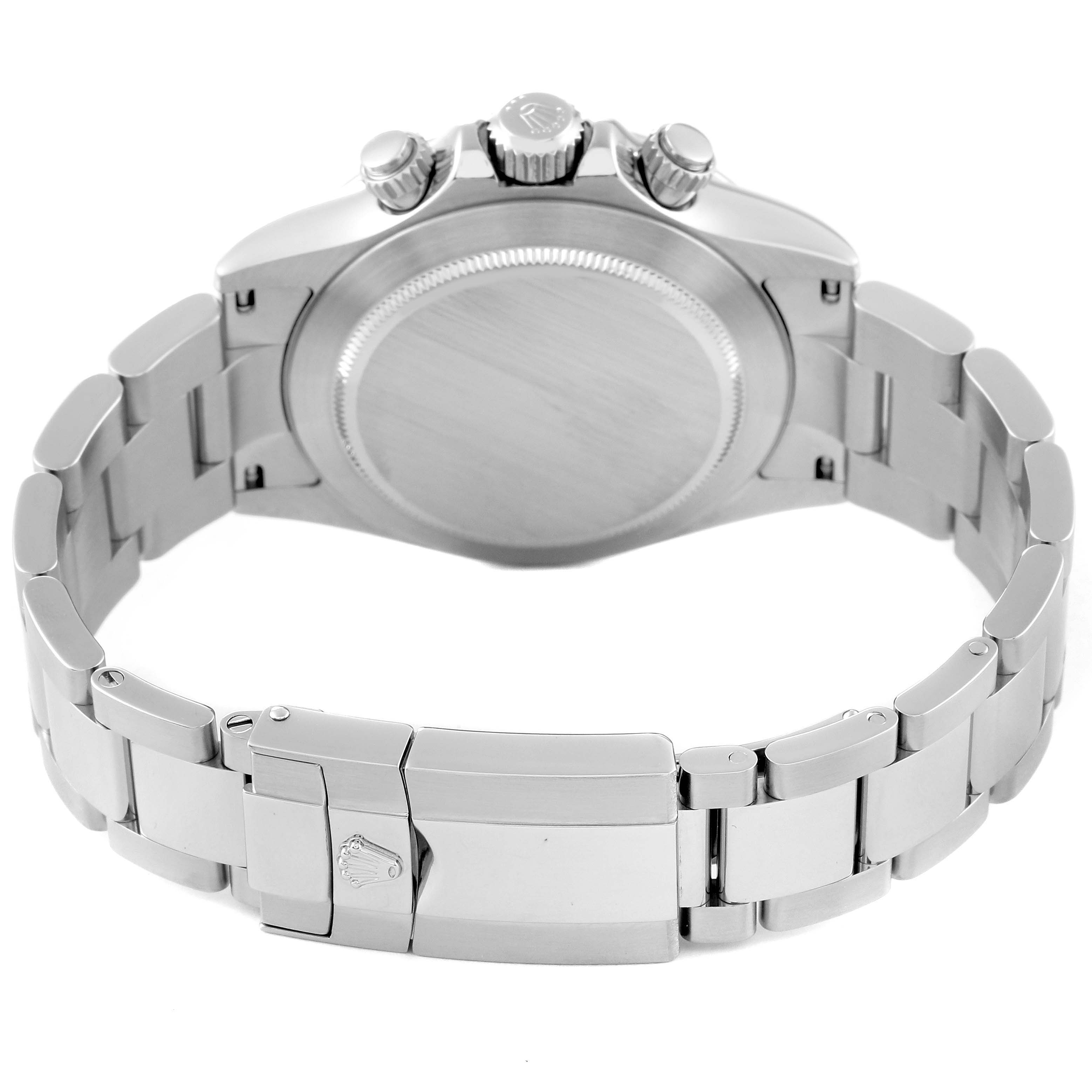 The Rolex Daytona 116520 Men's Stainless Steel White Dial 116520 Men's Stainless Steel White Dial watch is shown from the back, displaying the case back and bracelet with a focus on the clasp.