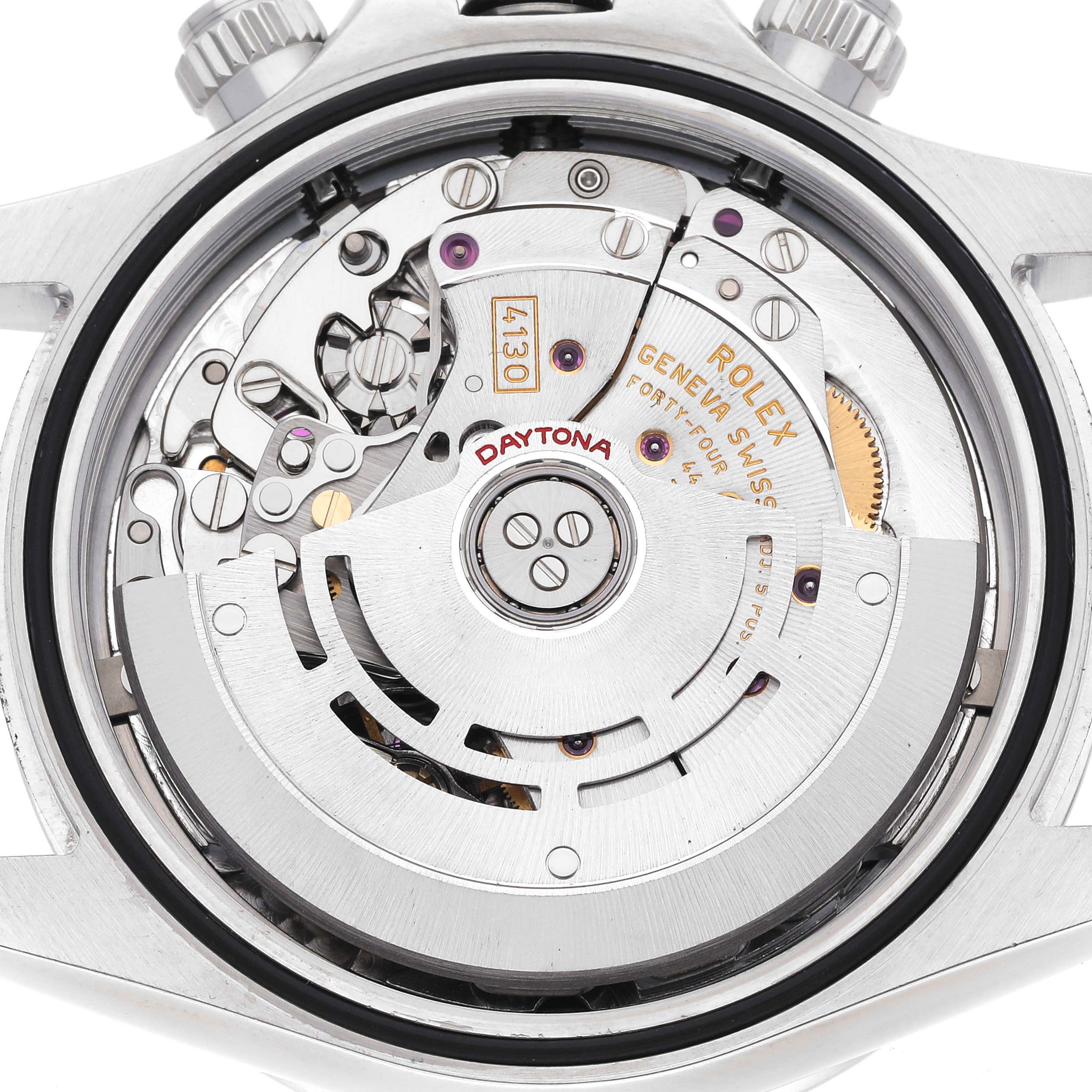 The image shows the movement of a Rolex Daytona 116520 Men
s Stainless Steel White Dial 116520 Men
s Stainless Steel White Dial watch from the back, highlighting intricate internal mechanisms.