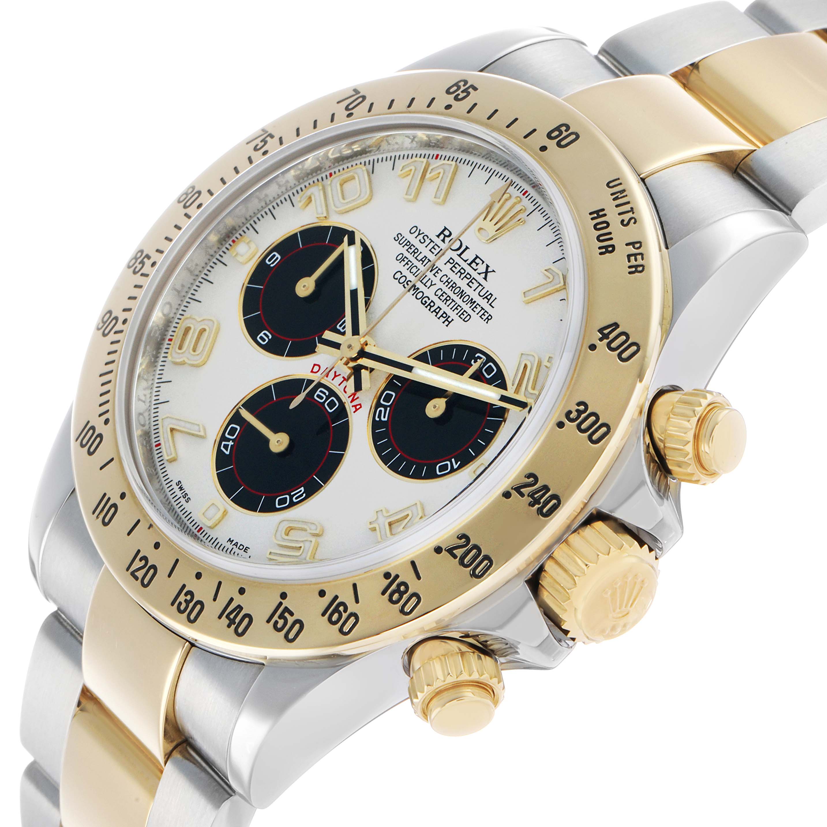The Rolex Daytona 116523 Men's Steel and Gold (two tone) Silver Dial watch is shown at an angled side view, highlighting the bezel, dial, pushers, and bracelet links.