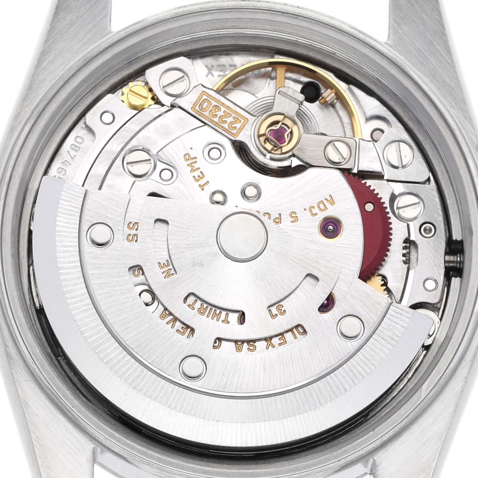 The image shows a close-up of the movement mechanism in a Rolex Oyster Perpetual 76080 Women's Stainless Steel Black Dial 76080 Women's Stainless Steel Black Dial watch, highlighting the rotor and intricate components.