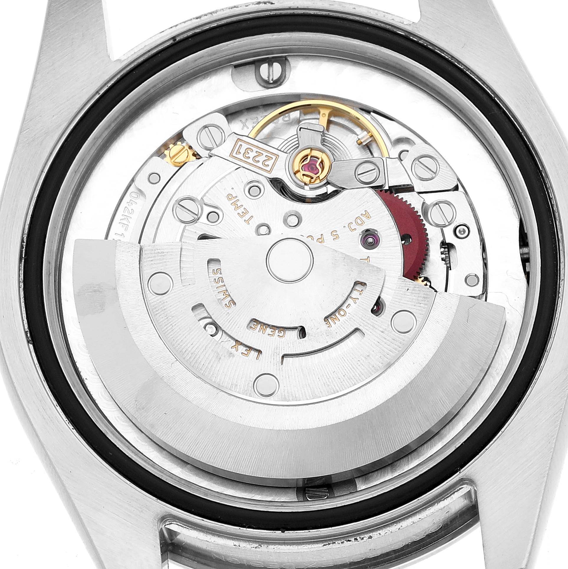 The image shows the back view of a Rolex Mid-Size 177200 Women's Stainless Steel Blue Dial model, highlighting its intricate movement components.