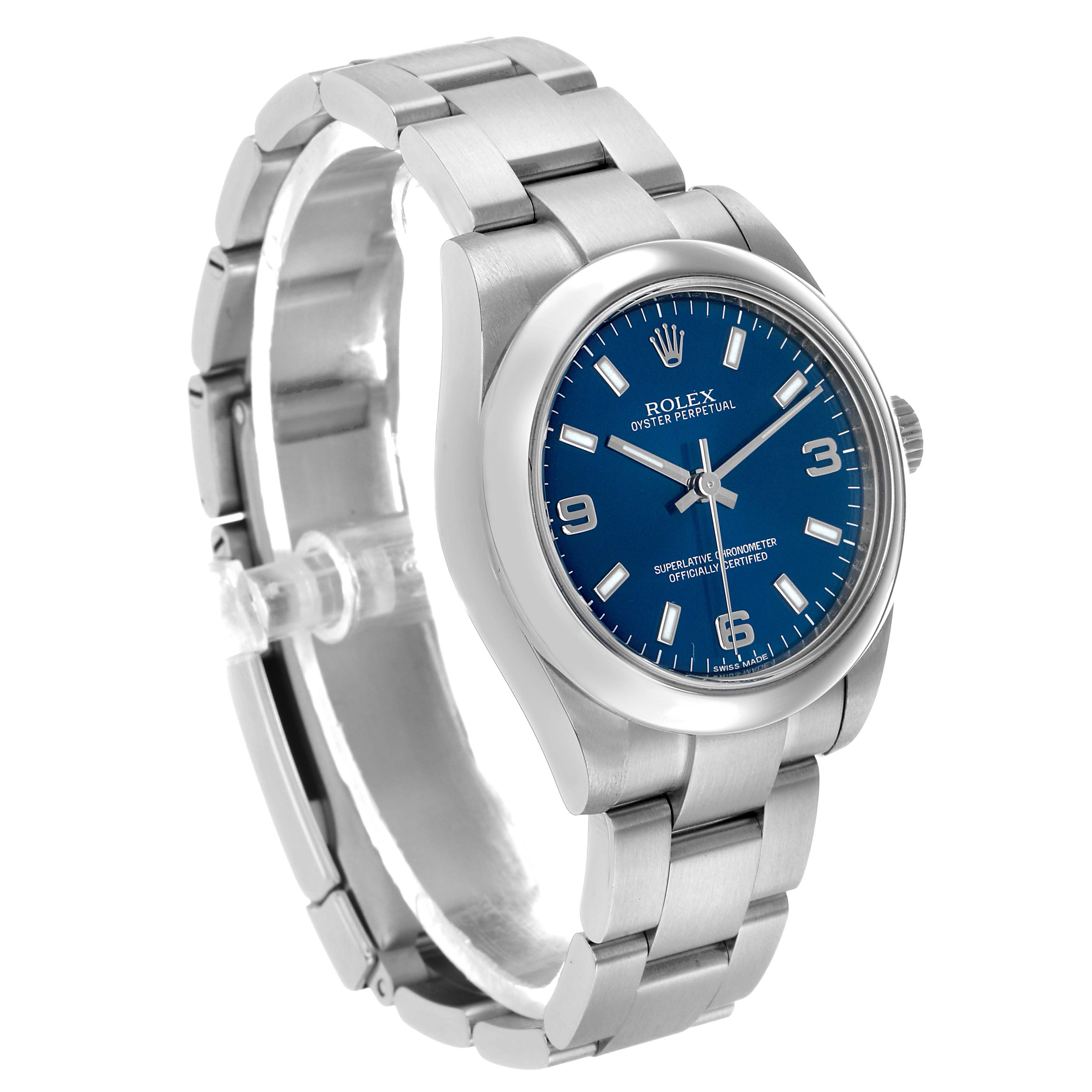 The Rolex Oyster Perpetual 177200 Women's Stainless Steel Blue Dial watch is shown at a three-quarter angle, highlighting its blue dial, stainless steel case, and bracelet.