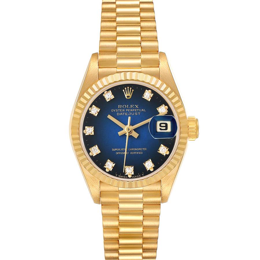 The Rolex President 69178 Women's Yellow Gold Blue Dial watch is shown from a top-down angle, displaying the face, bezel, and bracelet in gold.